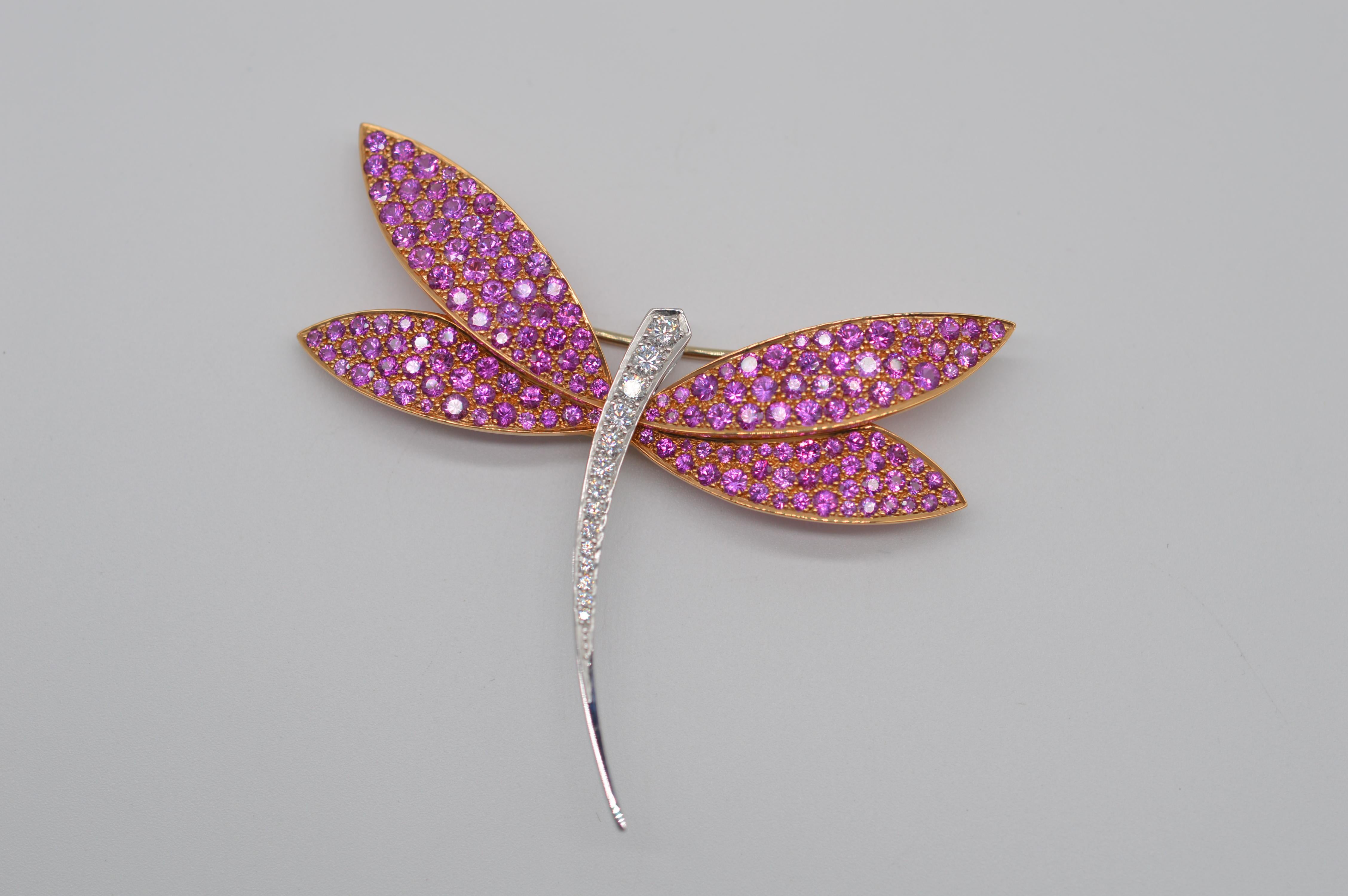 Van Cleef & Arpels Dragonfly Brooch Unworn
18K Yellow & White Gold 
Weight 16.5 grams
Diamonds & Pink Sapphires Setting
Seti with 14 Round Diamond for an approximative weight of 0.50 carats (Color D-E / Clarity VVS1-VVS2) / Set with 158 Pink