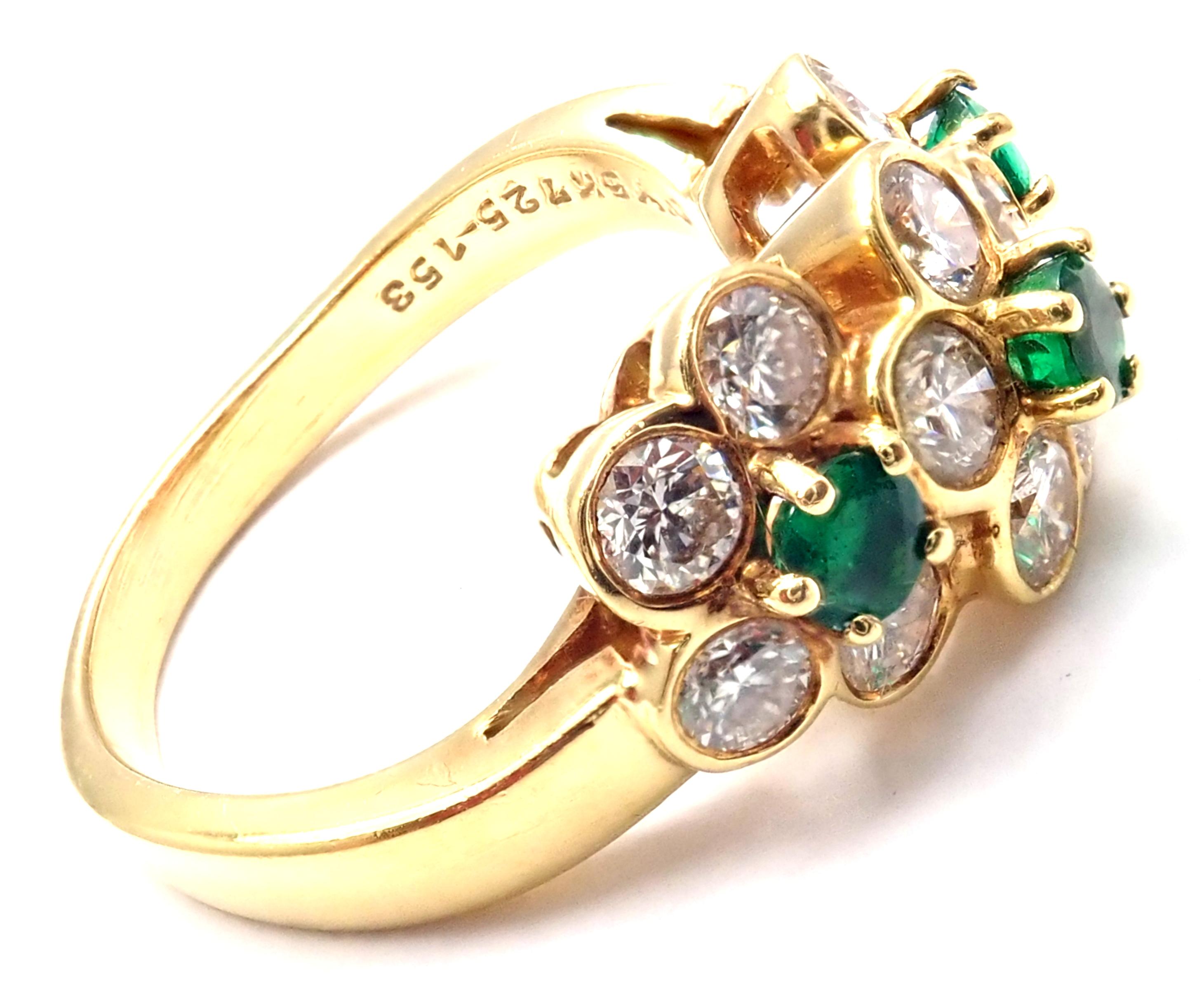 18k Yellow Gold Diamond And Emerald Flower Band Ring by Van Cleef & Arpels. 
With 13 diamonds, VS1 Clarity, G Color. Total Diamond Weight approx. 1.00ctw. 
3 Emeralds total weight approximately 0.39ct
Details:
Weight: 5.1 grams
Size: 4 3/4
Width at