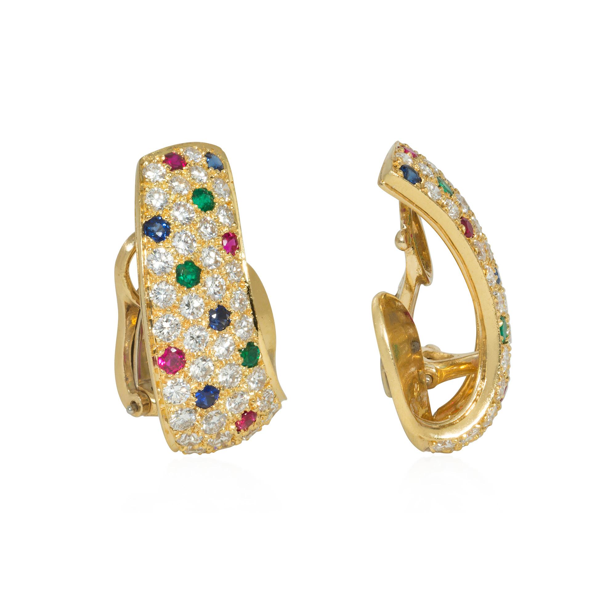 A pair of estate multi-gemstone and gold stylized half-hoop clip earrings, embellished with pavé diamonds, sapphires, emeralds, and rubies on the exterior, and polished gold interiors, in 18k. Van Cleef & Arpels, New York. #NY57012.

* Includes