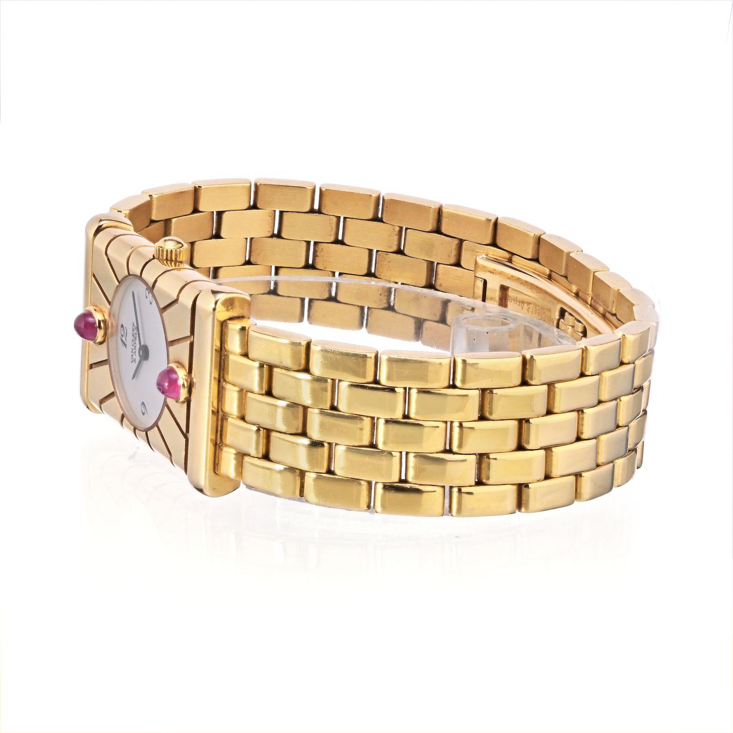Van Cleef & Arpels Façade 18K Yellow Gold Vintage Watch - Quartz. 18K Yellow Gold (22 mm x 33 mm) with red cabochin rubies on bezel. White dial with Arabic numerals.
Wrist size 6.75 to 7.25 inch.