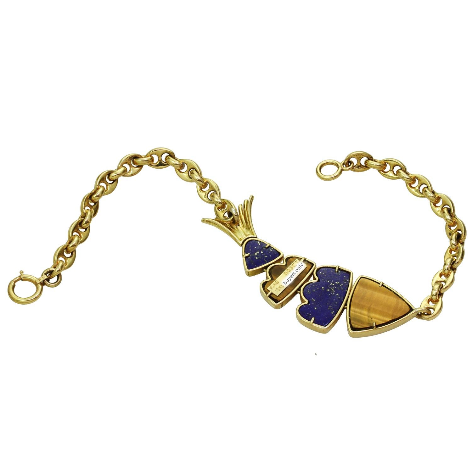 Van Cleef & Arpels Bracelet en or jaune avec œil de tigre en forme de poisson et lapis-lazuli Unisexe en vente