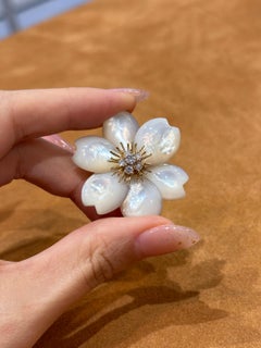 Van Cleef & Arpels “Fleur de Noël” Mother-of-Pearl and Diamond Brooch in Gold