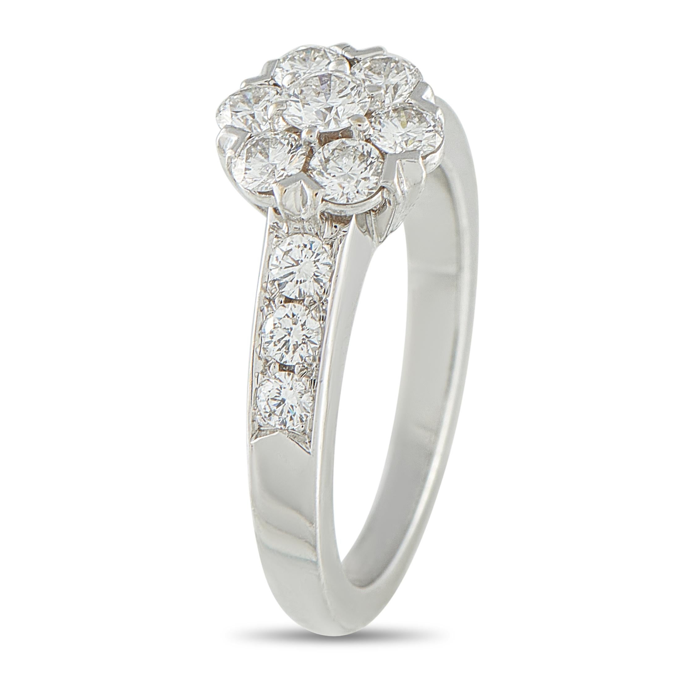 This Van Cleef & Arpels Fleurette ring is a luxury piece that is ideal for everyday wear. Sparkling Diamonds are beautifully showcased by this pieces sleek 18K White Gold setting. It features a 2mm wide band and a 6mm top height, making it an