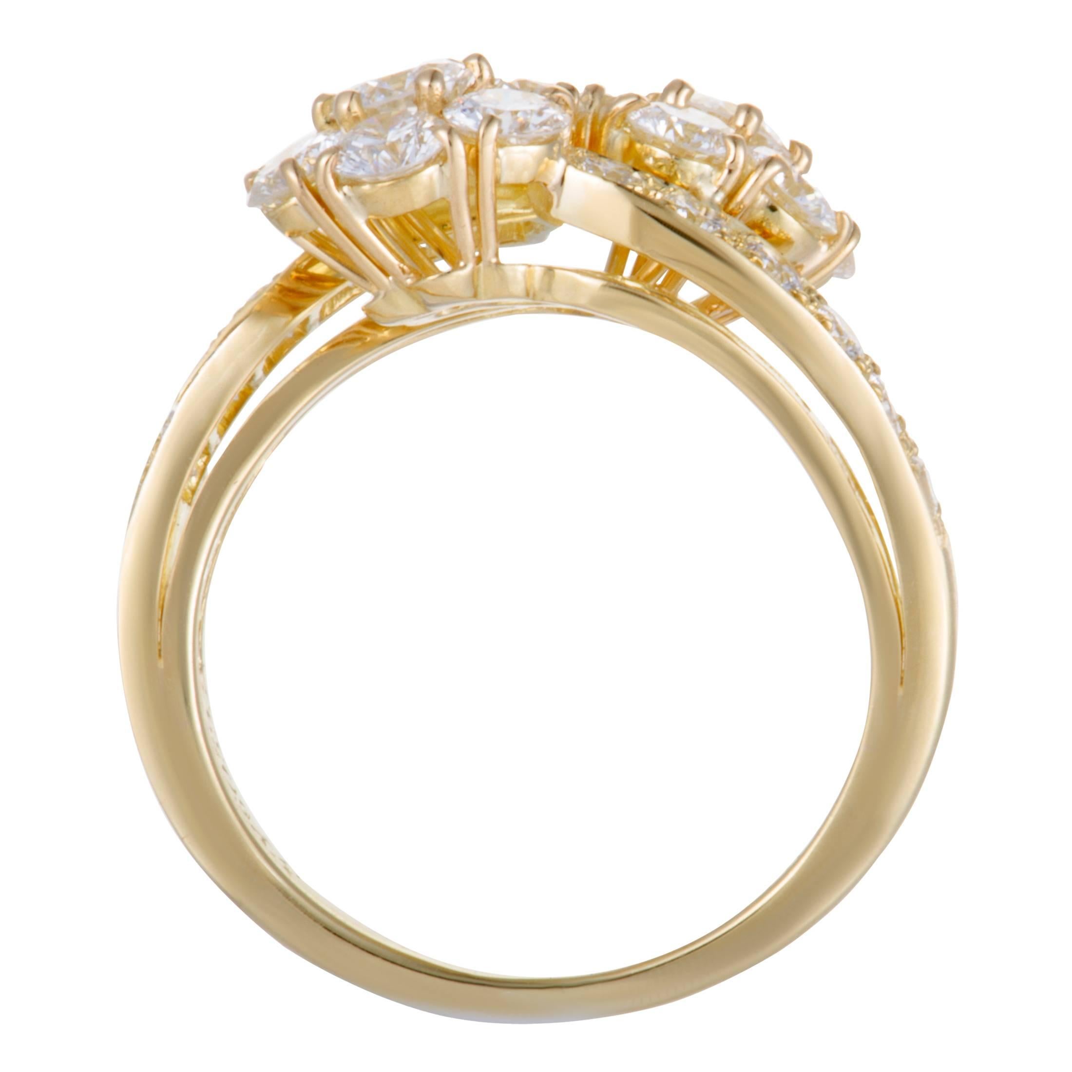 This fascinating ring by Van Cleef & Arpels is an item of prestigious quality and refined aesthetic style. The fabulous shimmer of 18K yellow gold in its design is perfectly complemented with the timeless resplendence of  diamonds, weighing