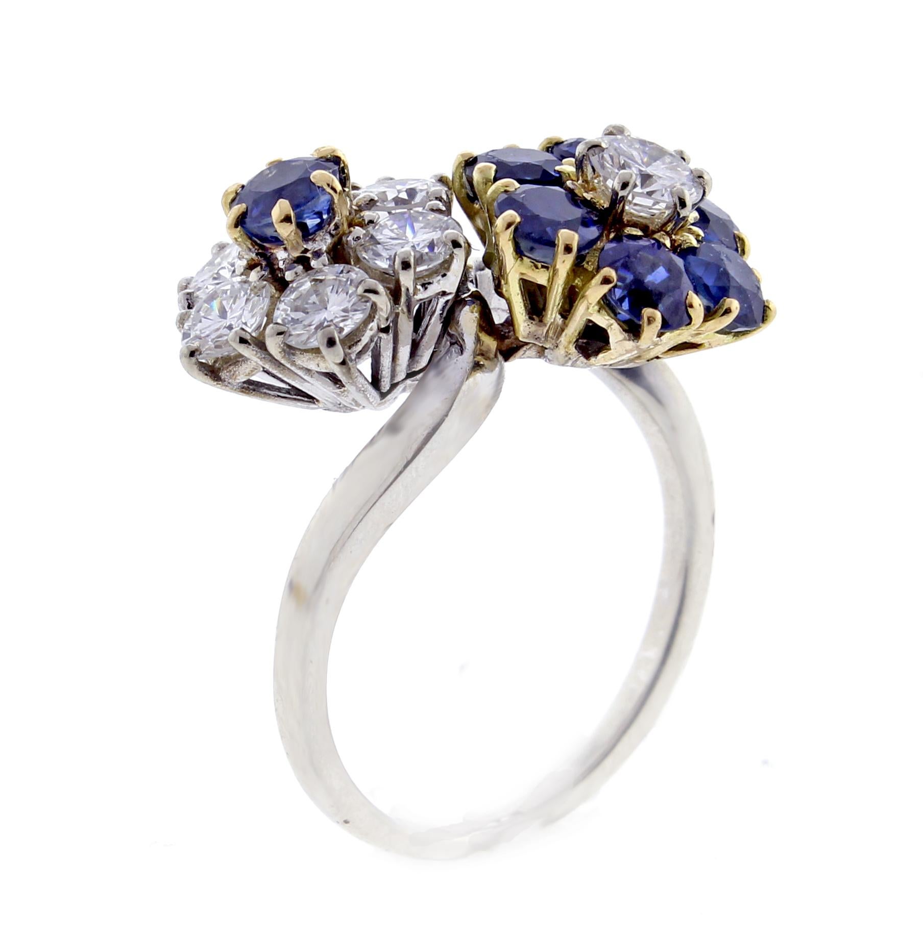 From the  Van Cleef & Arpels  Fleurette collection, a sapphire and diamond double flower ring. The ring boast 7 diamonds weighing approximately 1.40 carat and 7 sapphire weighing approximately 1.05 carats.  Set in 18 karat white and yellow gold.