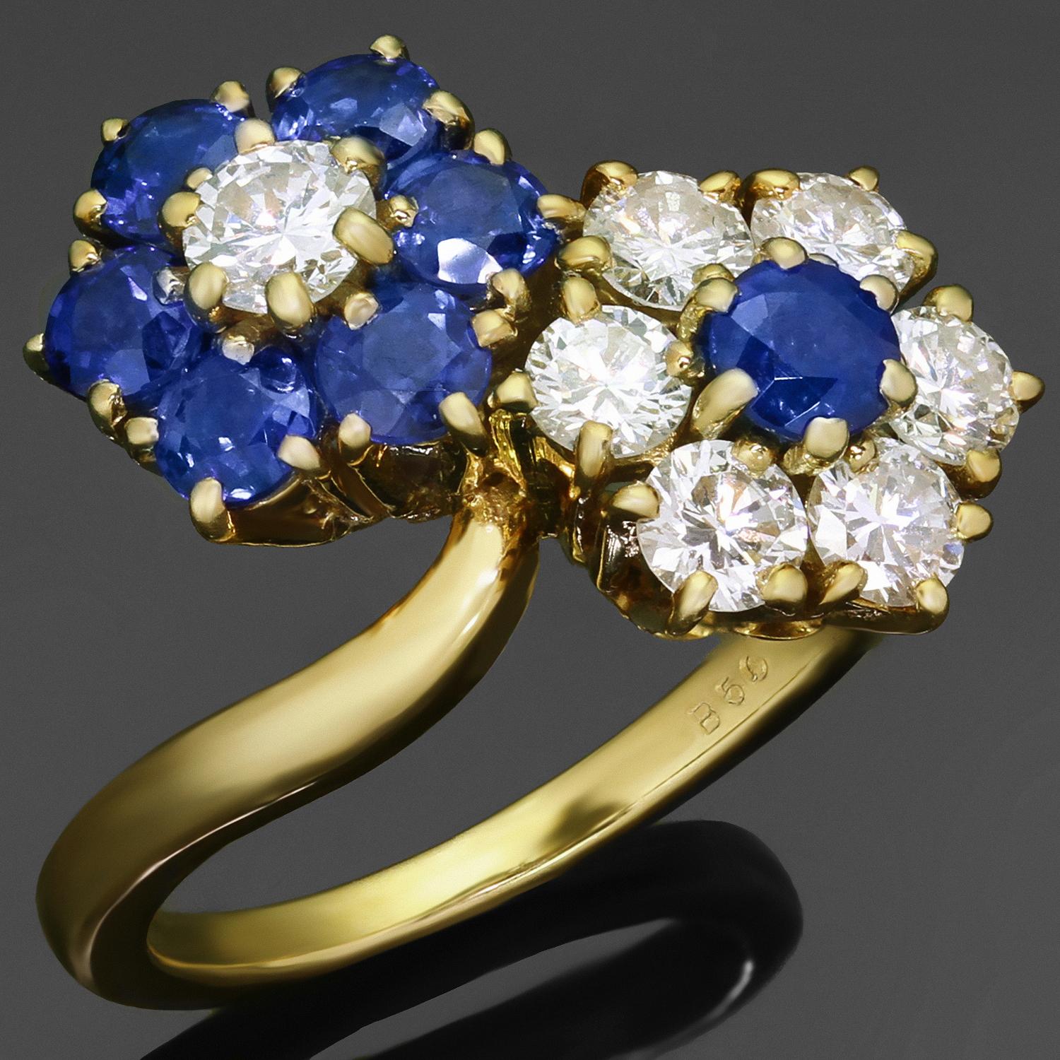 This gorgeous Van Cleef & Arpels ring from the exquisite Fleurette collection features a double flower design crafted in 18k yellow gold and set with round blue sapphires of an estimated 1.40 carats and brilliant-cut round D-F VVS1-VVS2 diamonds of