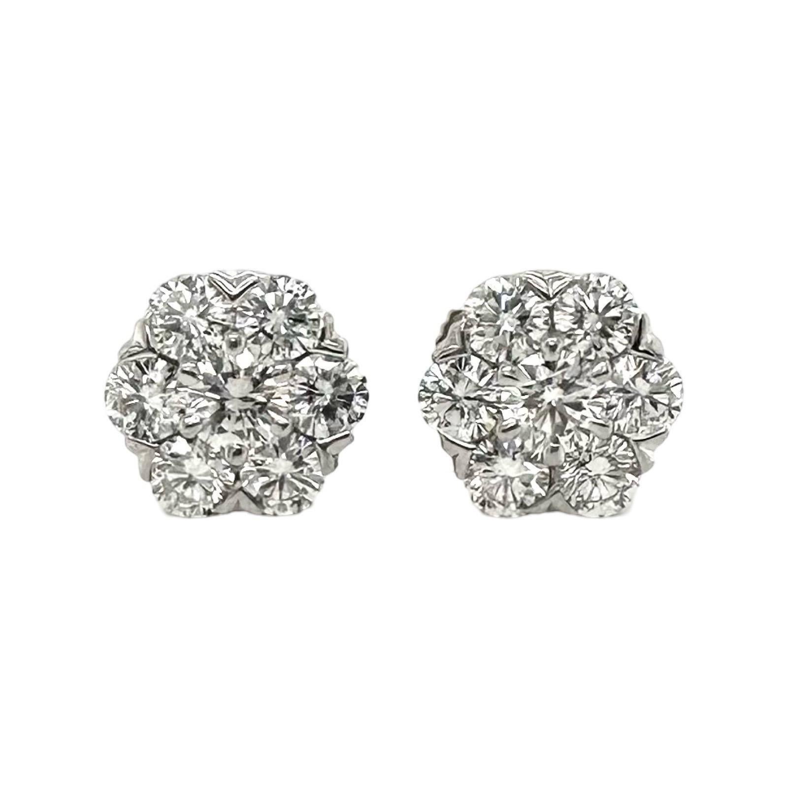 Taille ronde Van Cleef & Arpels Boucles d'oreilles Fleurette en or blanc 18 carats