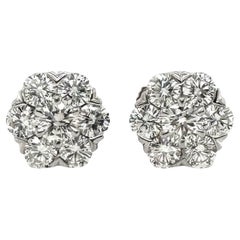 Van Cleef & Arpels Boucles d'oreilles Fleurette en or blanc 18 carats