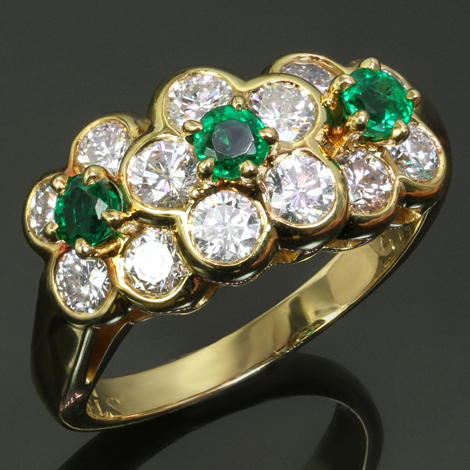 This exquisite Van Cleef & Arpels ring from the classic Fleurette collection is crafted in 18k yellow gold and set with green emeralds weighing an estimated 0.30 carats and brilliant-cut round D-F VVS1-VVS2 diamonds weighing an estimated 1.05