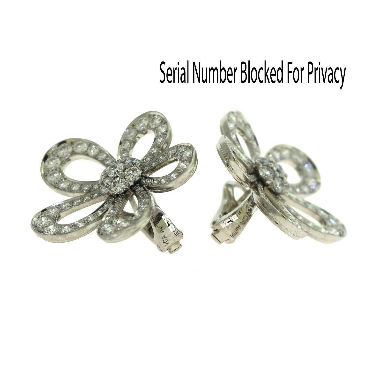 Designer: Van Cleef & Arpels

Collection: Flowerlace

Style: Large Flower Earrings

Material: 18k White Gold

Stones: 144 Round Brilliant Cut Diamonds

Diamond Carat:  approx. 4.5 ct

Total Item Weight (grams): 12.4

Earring Dimensions: approx. 1.15