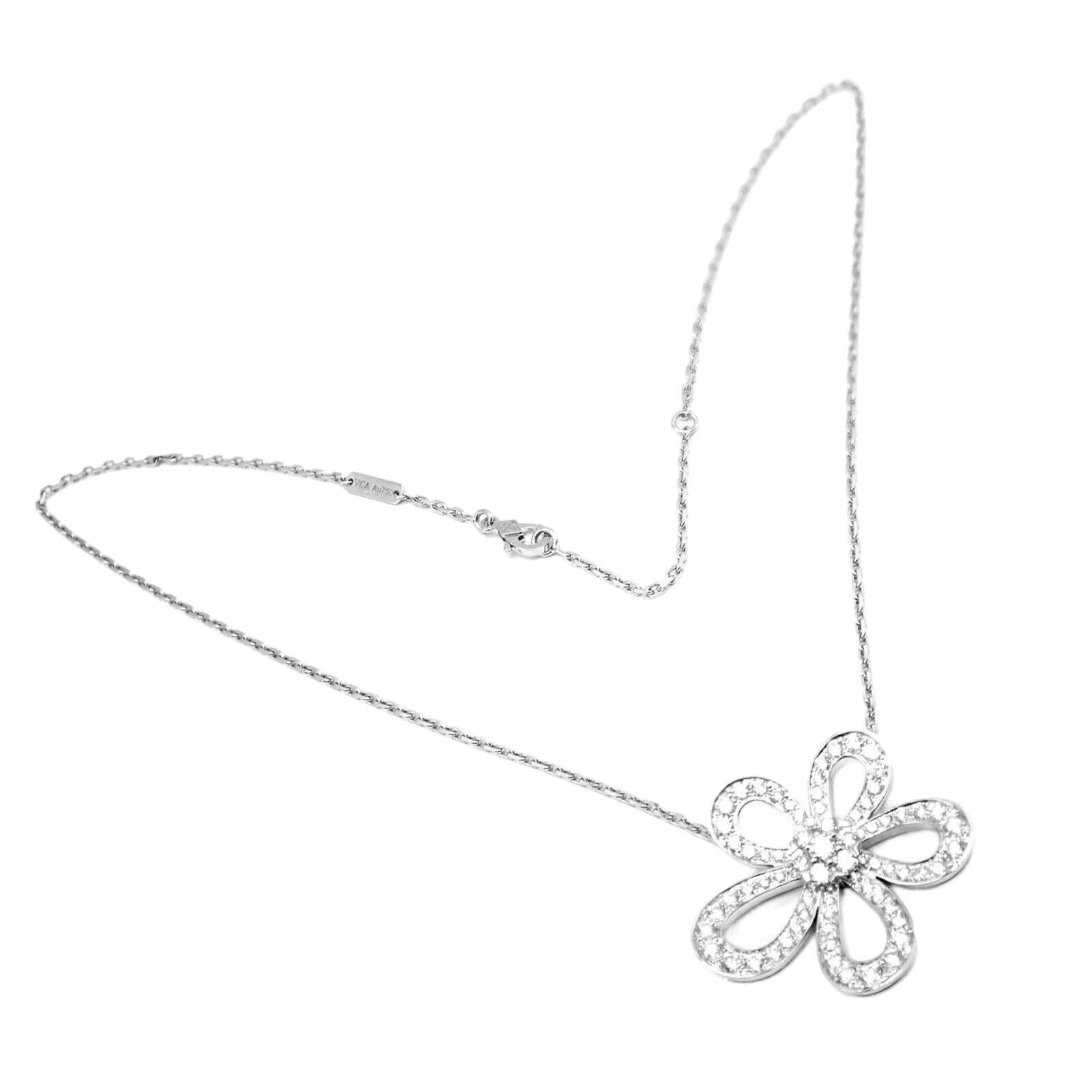 18k White Gold Diamond Flowerlace Large Pendant Necklace by Van Cleef & Arpels.
With 78 round brilliant cut diamonds VS1 clarity, E color total weight approximately 2.37ct
The Authentic Van Cleef & Arpels Flowerlace 18k Gold Diamond Pendant Necklace