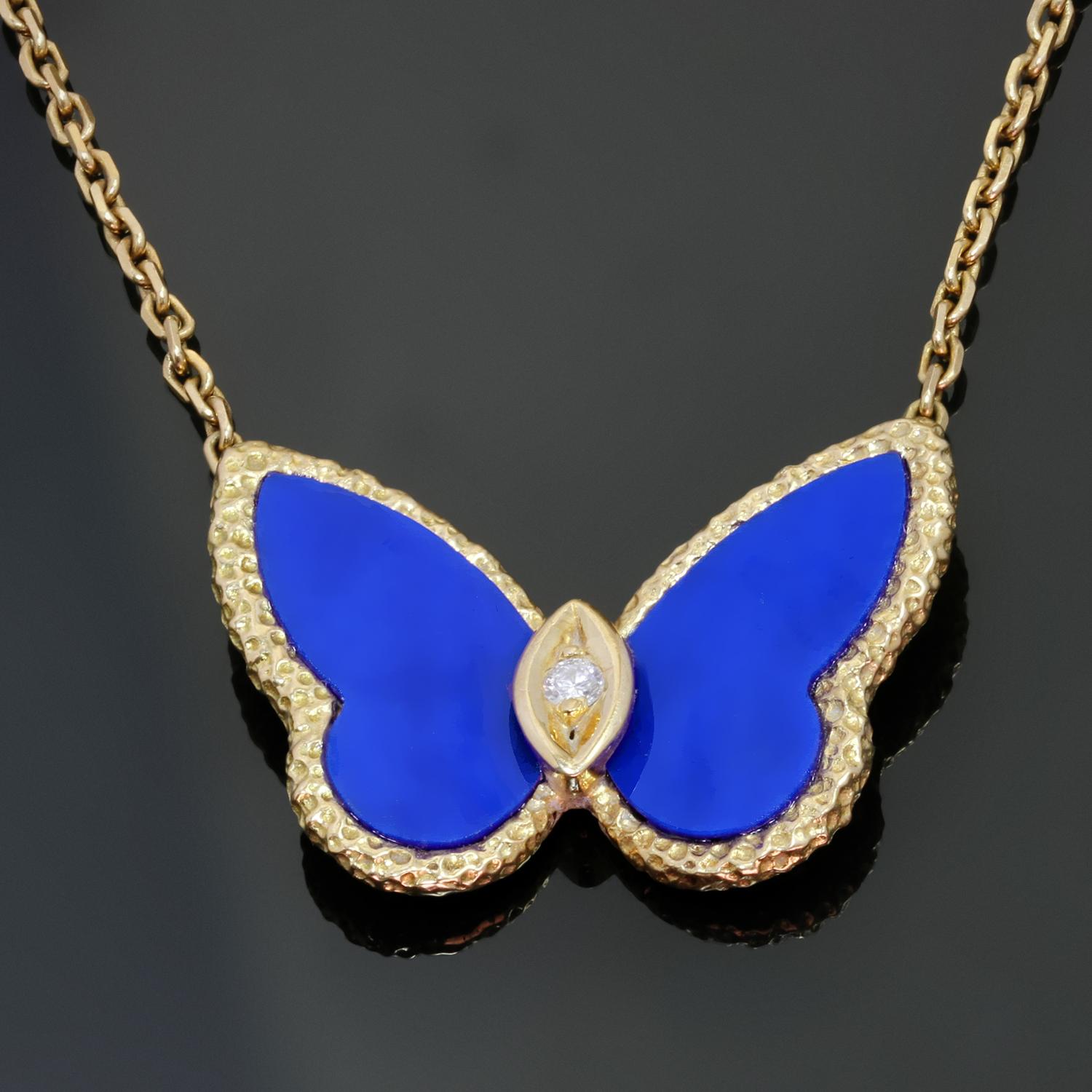 This stunning vintage Van Cleef & Arpels necklace from the iconic Flying Beauties collection is crafted in textured 18k yellow gold and features a 12mm x 24mm butterfly pendant accented with blue lapis lazuli wings and a solitaire brilliant-cut