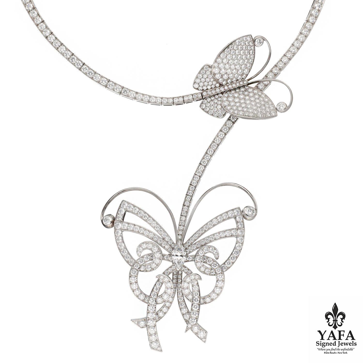 Van Cleef & Arpels 18K White Gold and Diamond Flying Butterfly Necklace with detachable Butterfly is a beautiful and whimsical piece of jewelry that captures the elegance and grace of butterflies in flight. The diaphanous elegance of butterflies has