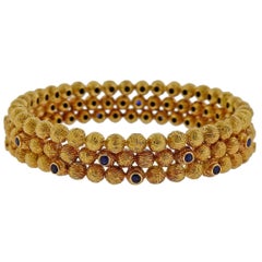 Van Cleef 
Arpels France 1970s Sapphire Gold Bangle Bracelet Set