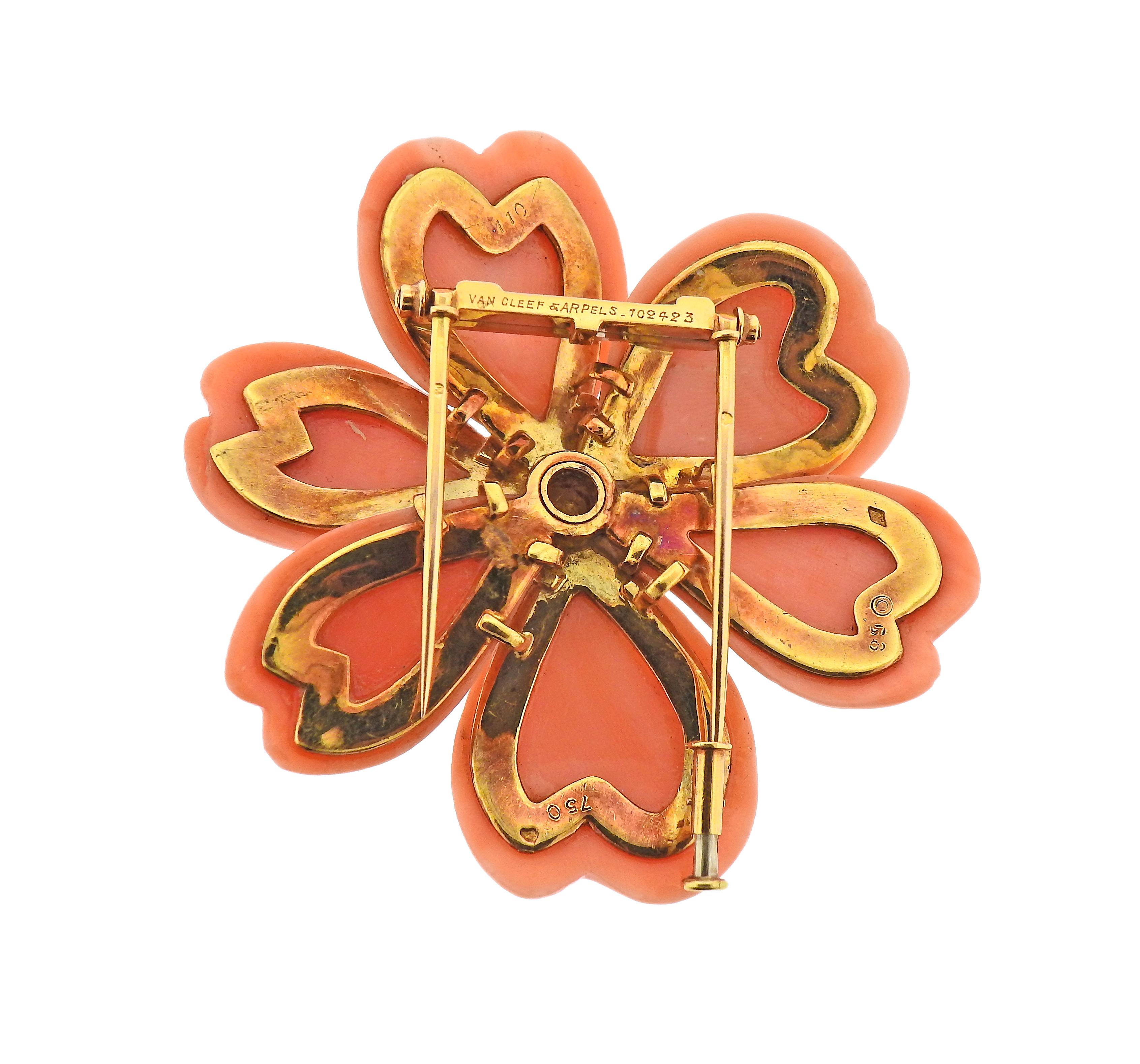 Large Van Cleef & Arpels 18k gold flower brooch, made in France. Featuring coral petals and approx. 1.70cts in diamonds. Brooch measures 52mm x 52mm. Marked: 750, Van Cleef & Arpels, French marks, 53, 110. Weight - 33.3 grams. Comes in VCA box.