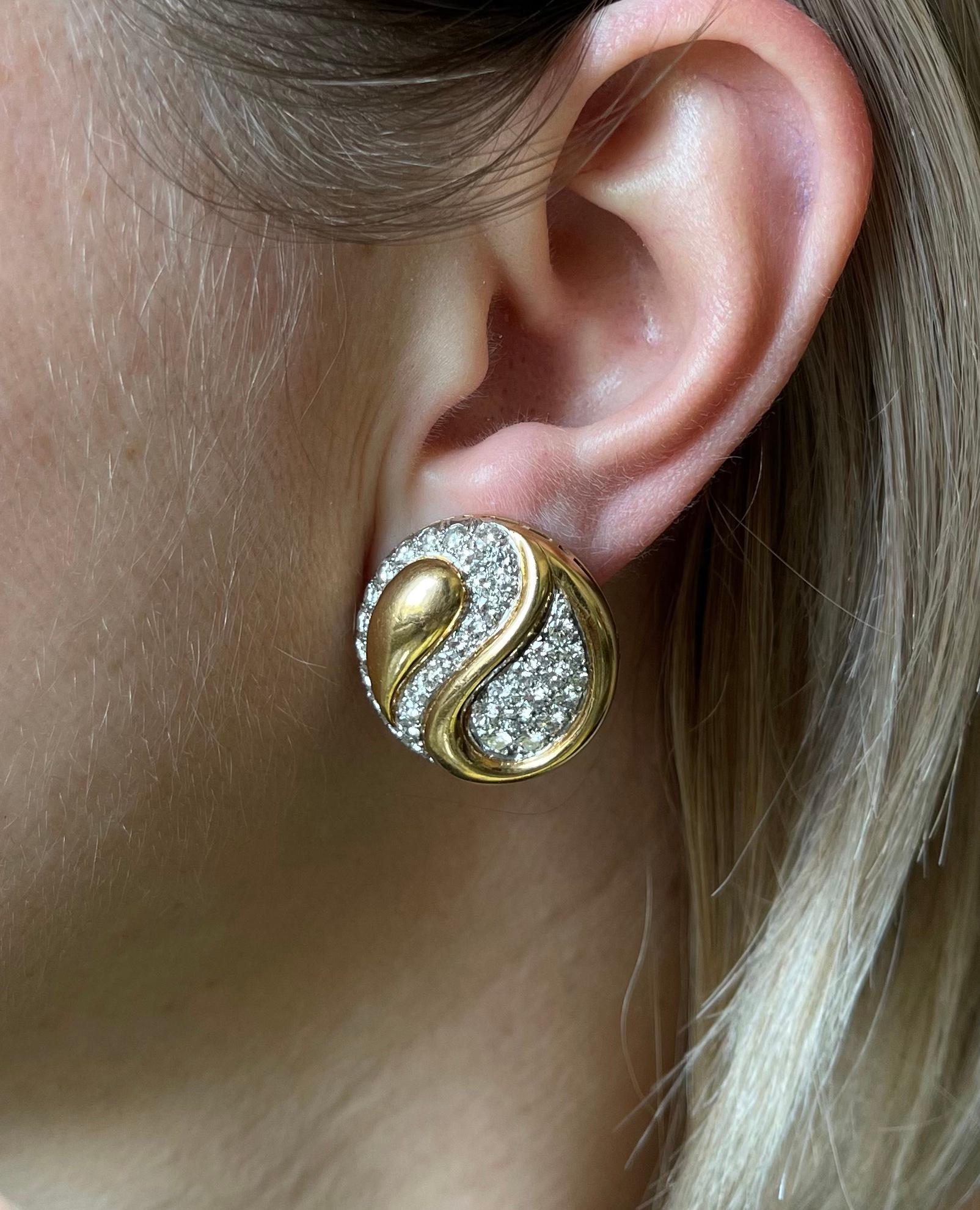 Exquisite French made pair of button earrings by Van Cleef & Arpels, in 18k yellow gold, set with approx. 3.80ctw in FG/VVS diamonds. Earrings measure 1