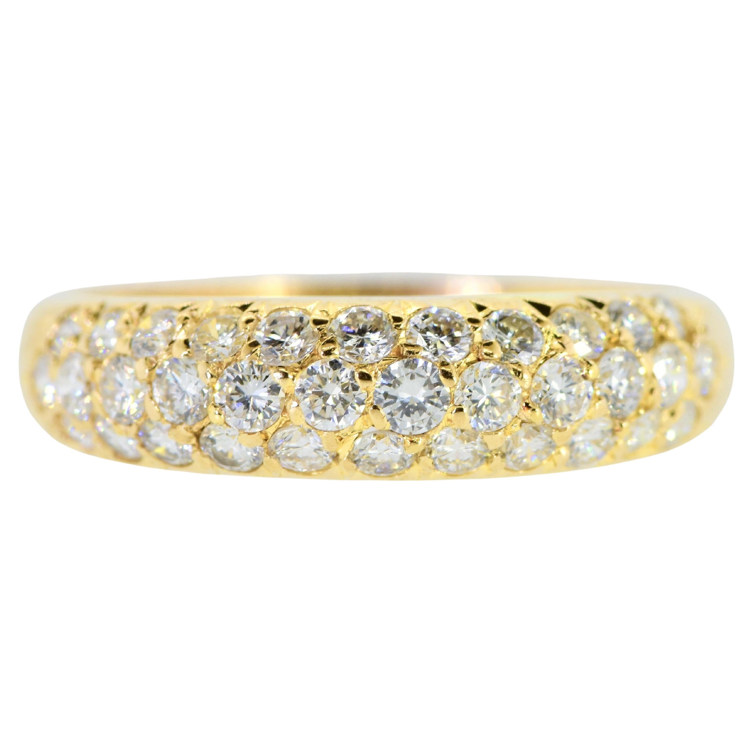 Van Cleef & Arpels diamond vintage band In 18K yellow gold, this is a choice graduated band of 34 round brilliant cut fine white diamonds.  All are estimated to be very very slightly included, VVS, to very slightly included and colorless to near