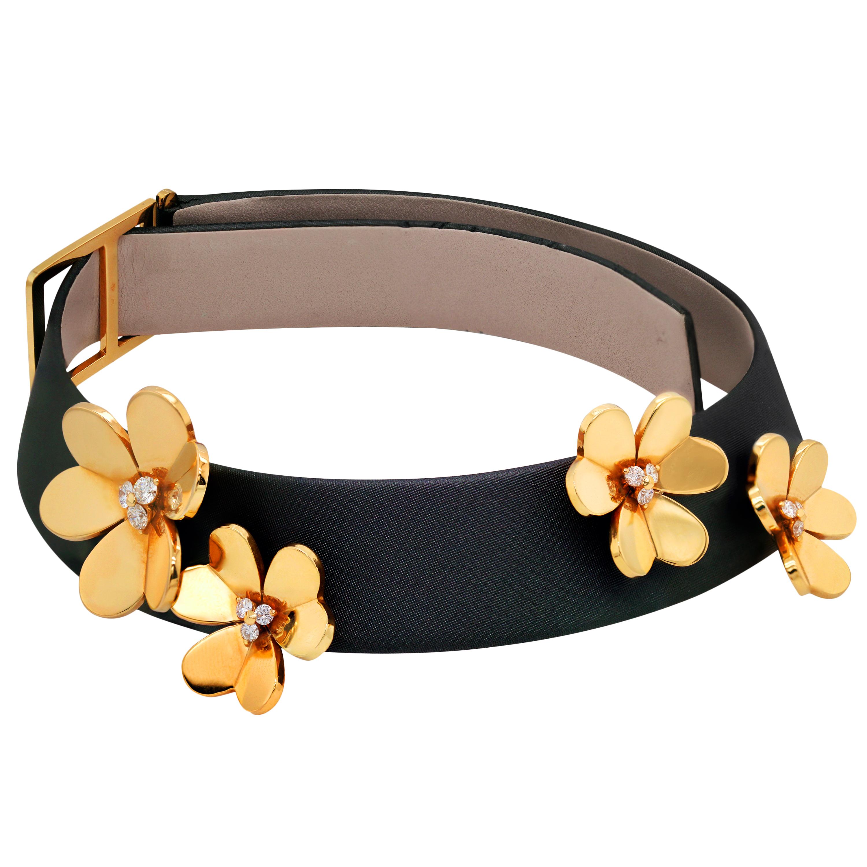 Van Cleef & Arpels Frivole 18 Karat Yellow Gold Diamond Collar Choker Necklace

This rare  choker necklace from the famous Frivole collection by Van Cleef and Arpels features four adjustable Ravena cords with four 18k yellow gold flowers accented