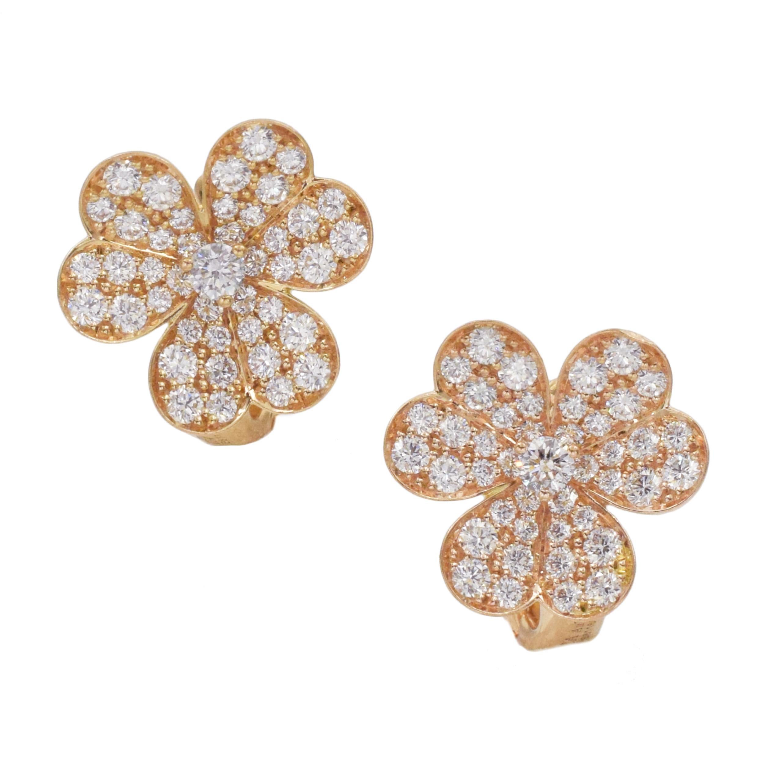 Van Cleef & Arpels 'Frivole' Diamond and Rose Gold Earrings. This pair of earrings
has 2 flower motifs with round diamonds weighing approximately 1.65ct (Color: E/F, Clarity:
VS) all set in 18k rose gold. Earrings has post with omega backs. Signed