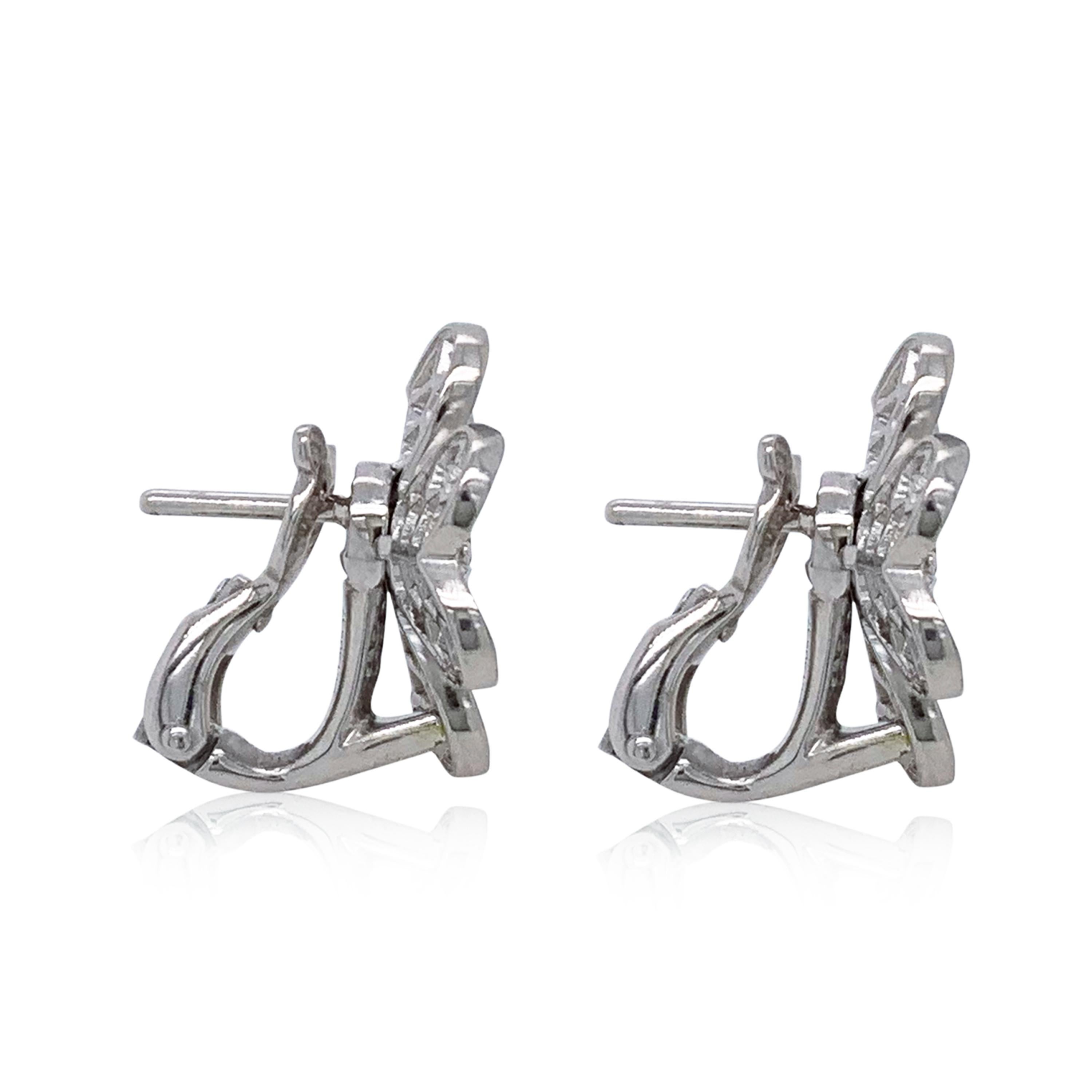 Van Cleef & Arpels Frivole diamond flower earrings in 18k white gold, small model.

These earrings feature 86 round brilliant cut diamonds totaling approximately 1.61 carats with D-E-F color and VVS+ clarity.  The stems are detachable so the