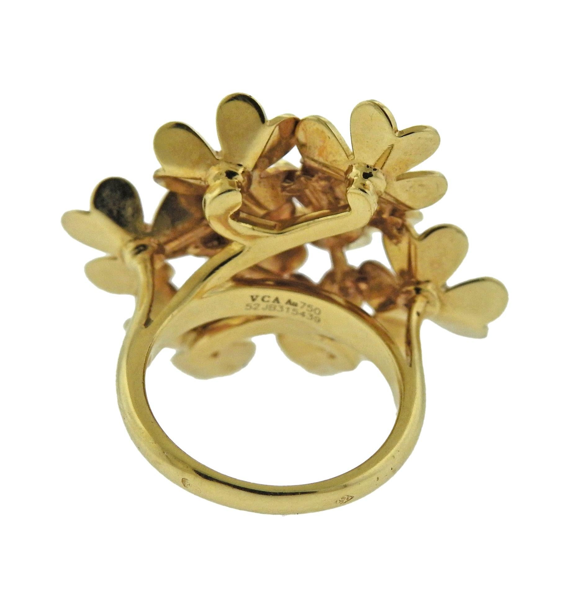 18k yellow gold Frivole ring, crafted by Van Cleef & Arpels, featuring flower motifs, each set with a diamond (total approx. 0.43ctw VVS/FG). Retail $9250. Comes with box. Ring size - 6.25, ring top is 32mm x 27mm, weighs 11.4 grams. Marked: VCA,