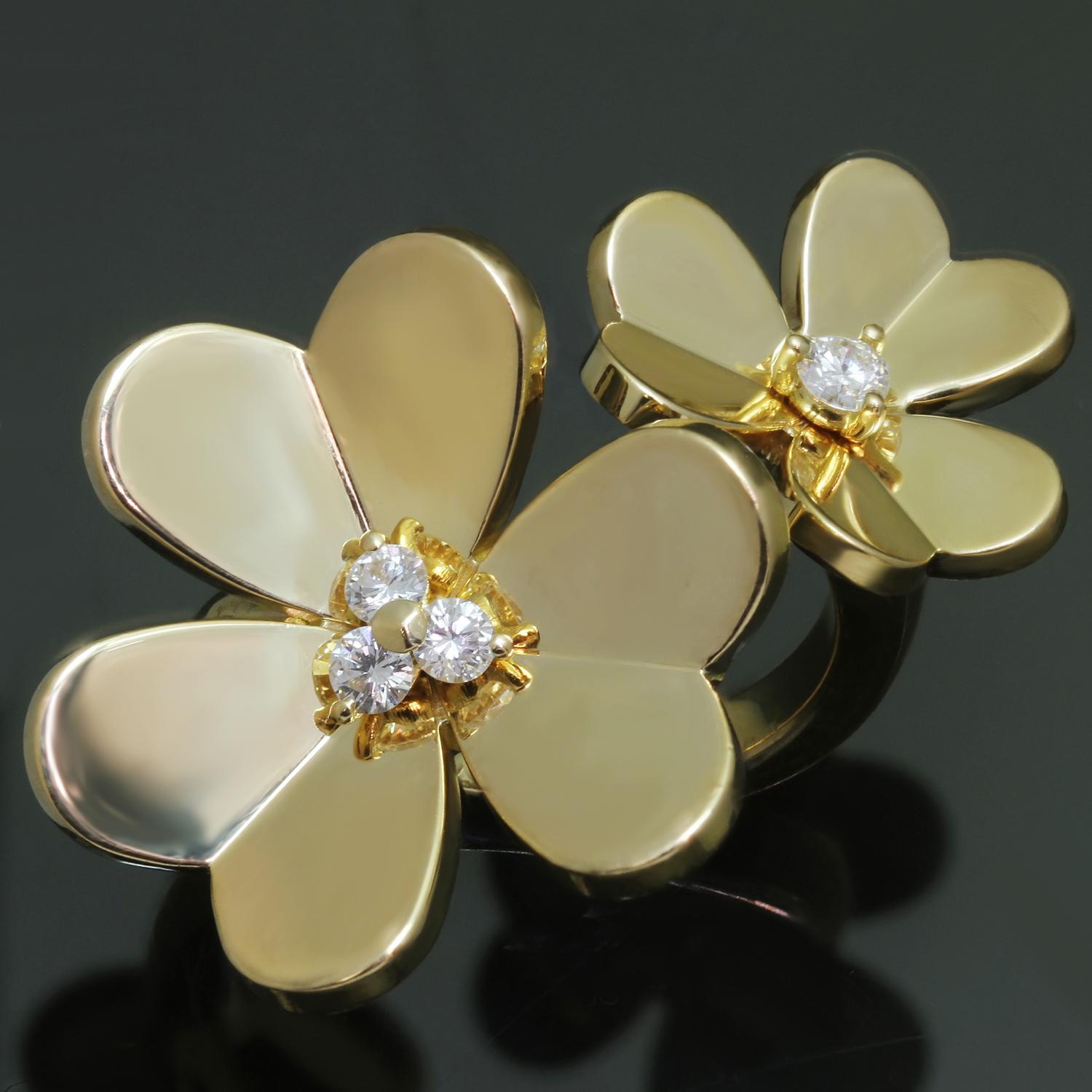 This gorgeous Van Cleef & Arpels between-the-finger ring from the iconic Frivole collection is crafted in 18k yellow gold and features an elegant two flower design set with 4 brilliant-cut round D-F VVS1-VVS2 diamonds of an estimated 0.24 carats.