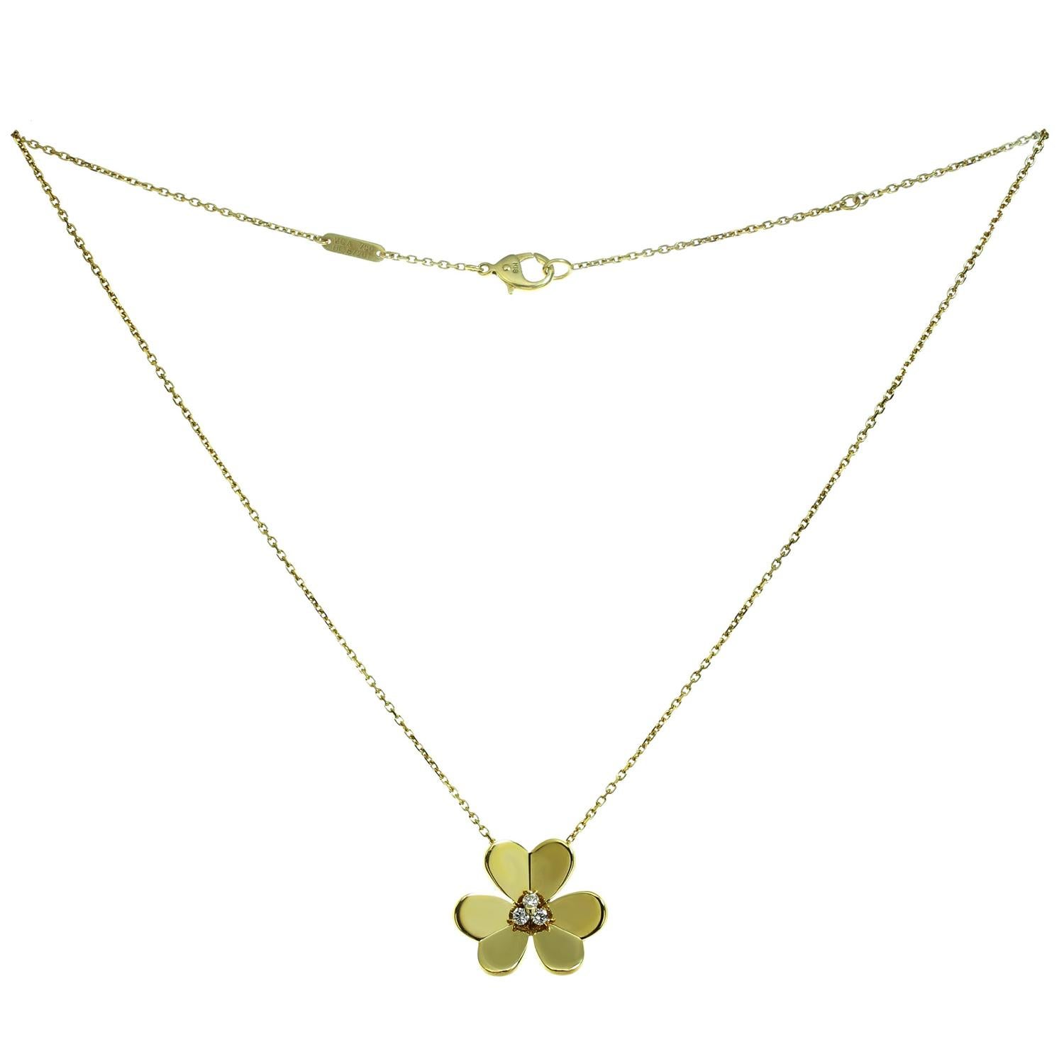 This elegant Van Cleef and Arpels necklace from the iconic Frivole collection is crafted in 18k yellow gold and features a flower pendant set with 3 round brilliant D-E-F VVS1-VVS2 diamonds weighing an estimated 0.16 carats. Made in France circa