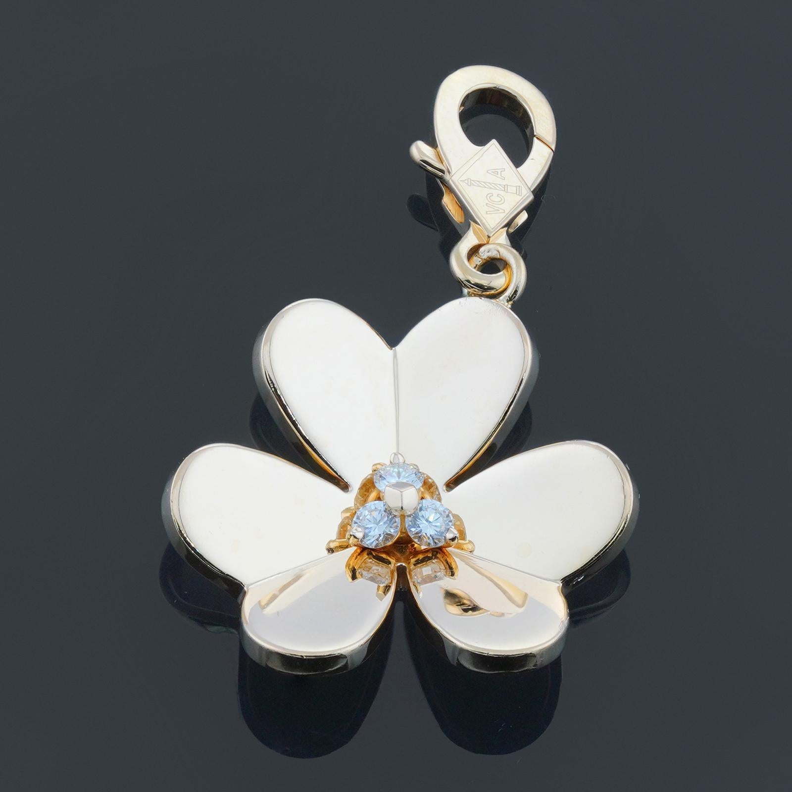 This gorgeous Van Cleef & Arpels pendant charm from the iconic Frivole collection is crafted in 18k yellow gold and prong-set with 3 brilliant-cut round diamonds. Made in France circa 2007. Measurements: 0.86