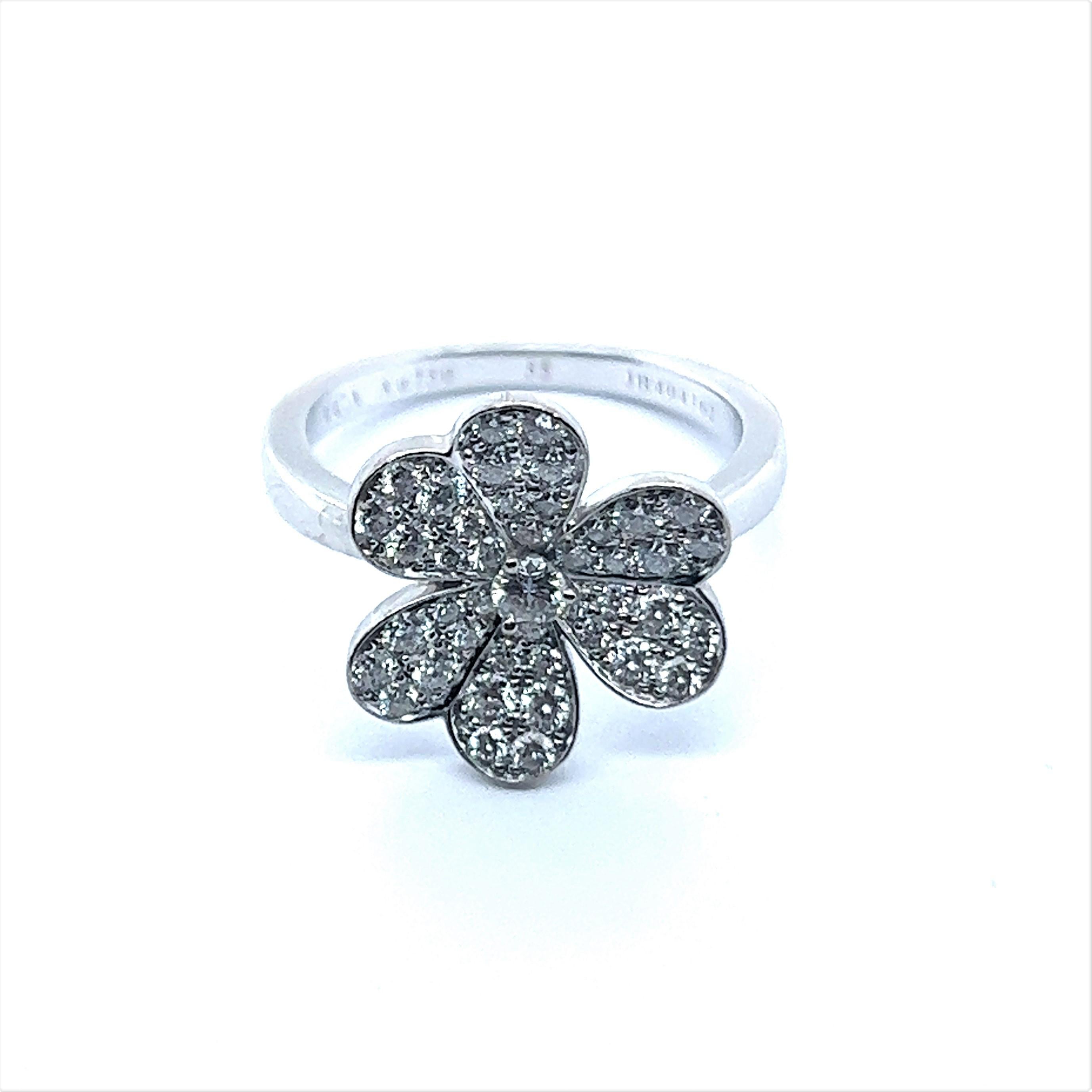 A charming floral ring from the iconic Frivole collection. 

This classic line was created by famous Jewelry House Van Cleef & Arpels and is inspired by the delicate beauty of nature at its most elegant manner. The name 