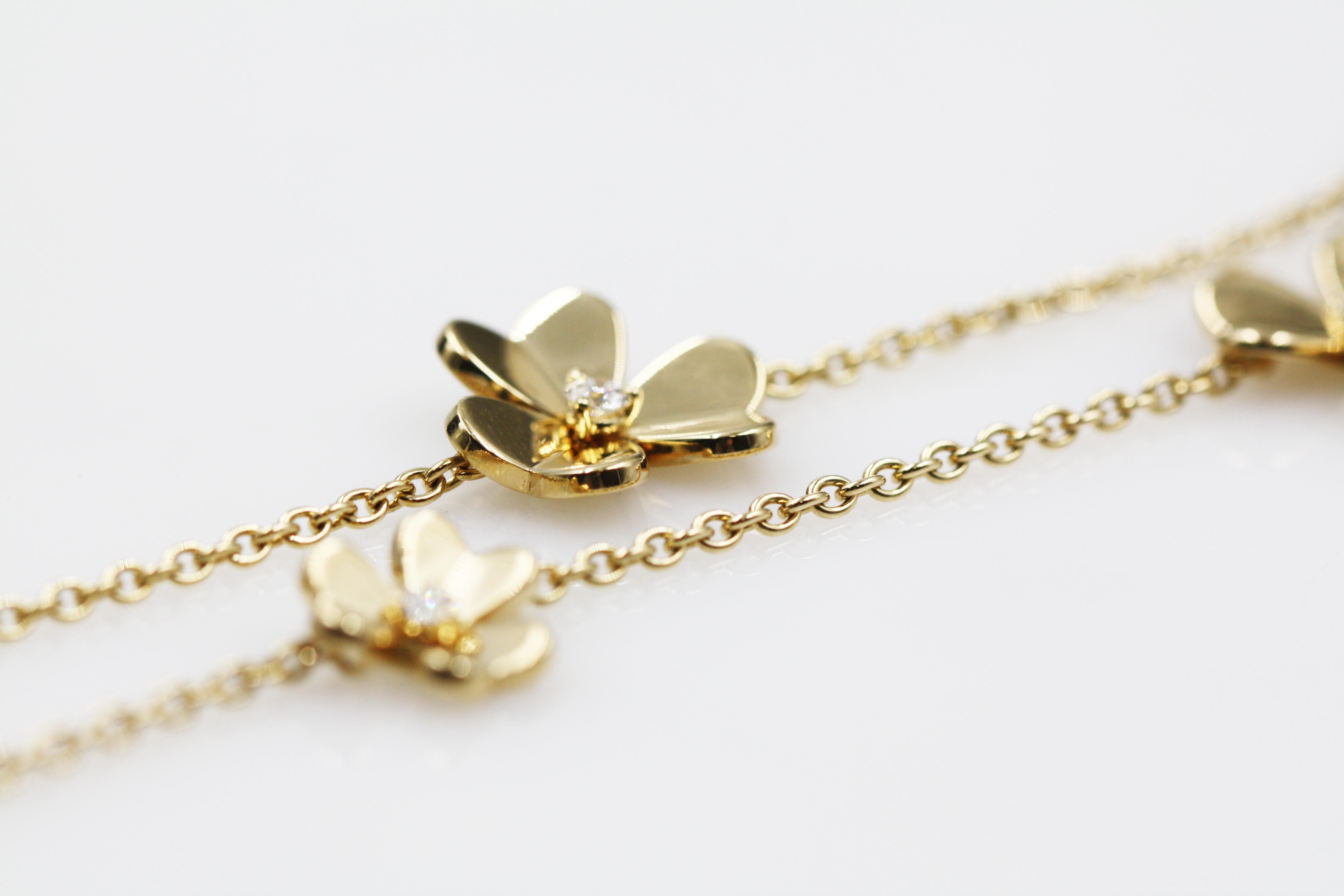 van cleef gold flower necklace