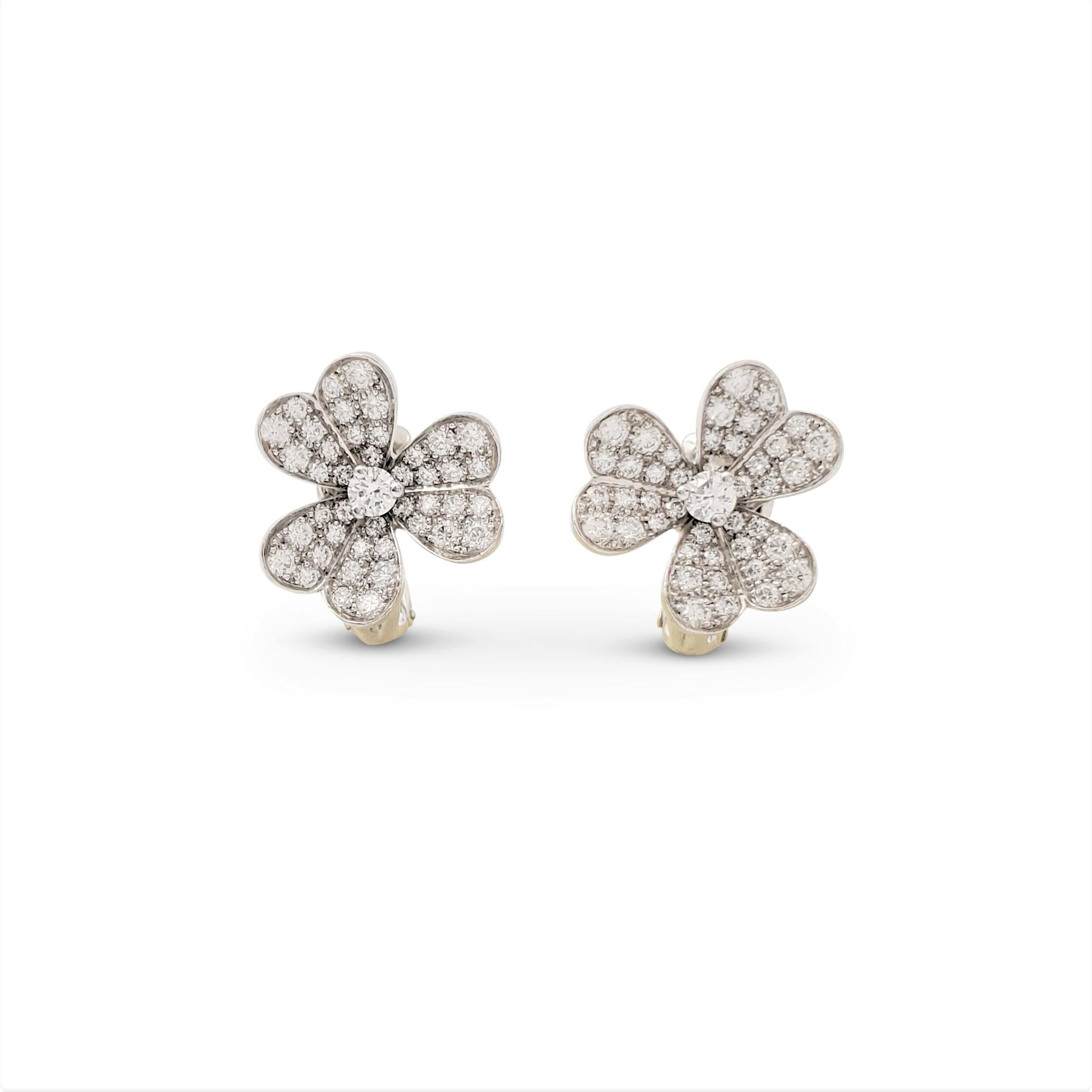 Authentic Van Cleef & Arpels 'Frivole' earrings feature 18 karat white gold heart-shaped petals set with sparkling round brilliant cut diamonds weighing a total of 1.61 carats total weight (E-F color, VS clarity). Signed VCA, Au750, with serial