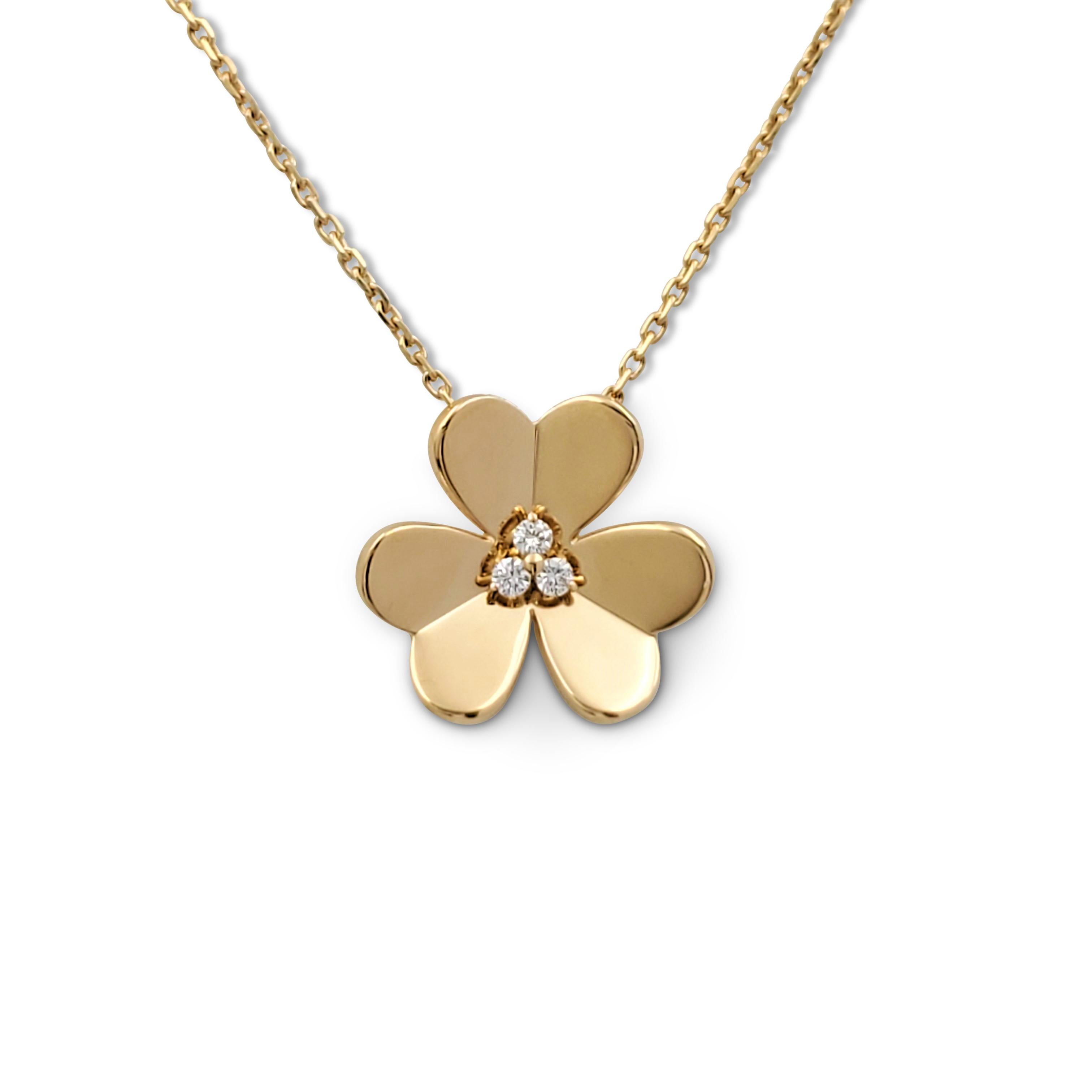 Authentic Van Cleef & Arpels 'Frivole' pendant necklace crafted in mirror-polished 18 karat yellow gold and set with an estimated 0.16 carats of round brilliant cut diamonds (E-F, VS) at the center. Signed VCA, 750, with serial number. The