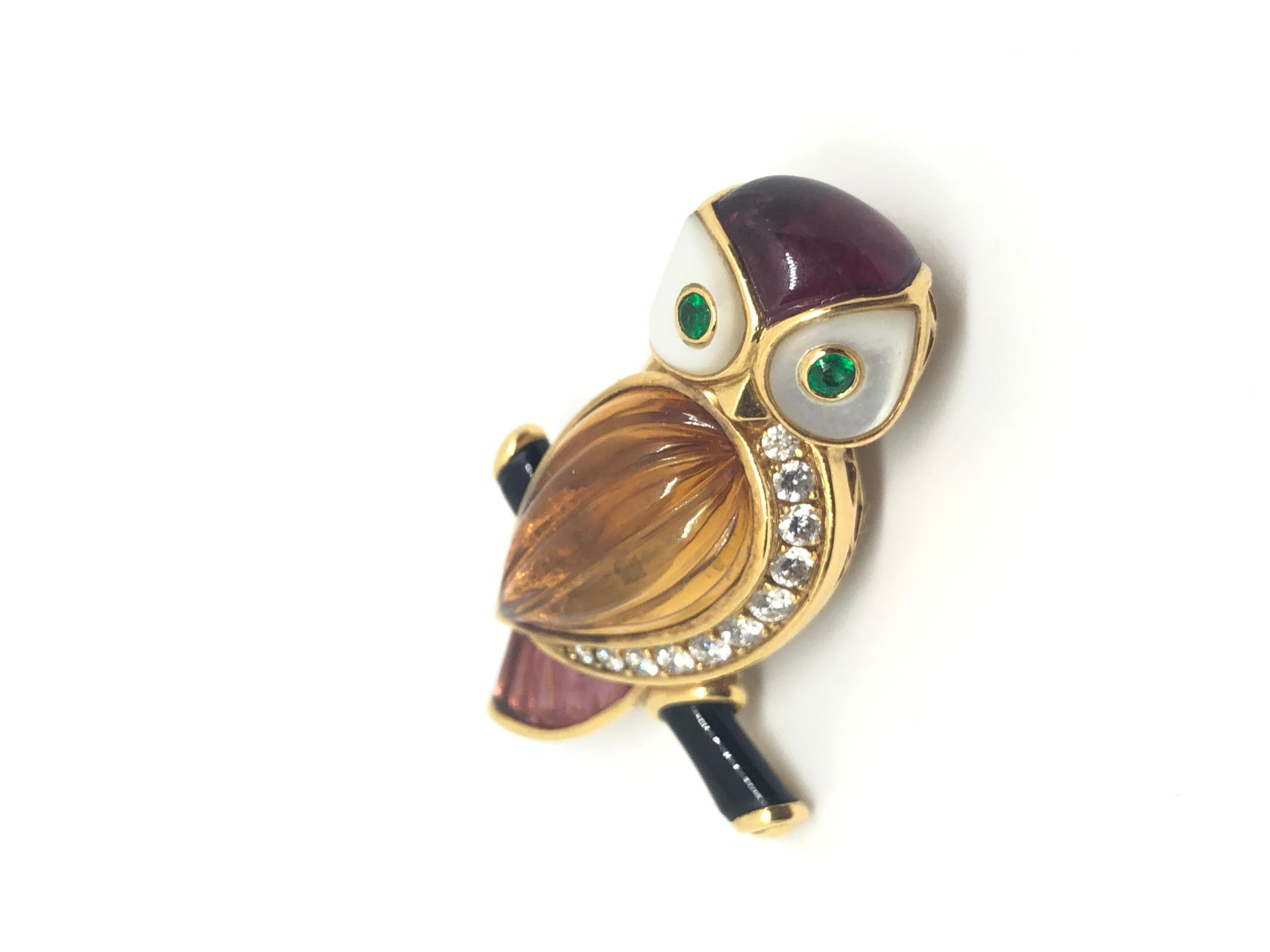Stunning Van Cleef & Arpels Brooch features a shape of a vibrant owl bird crafted in 18k Yellow, features and set with brilliant cut round diamonds, cabuchon rubelite, citrine and tourmaline. Stamped with VCA make’s mark, a hallmark for 18k gold and