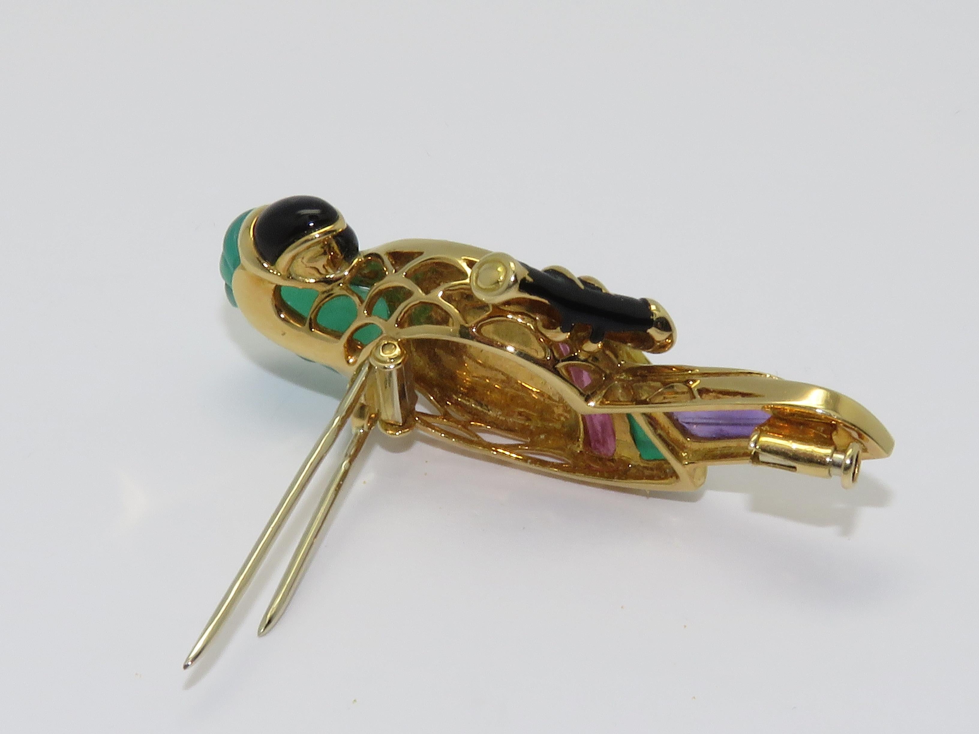 18 k yellow gold diamond , onyx , chrysoprase , amethyst  and citrine and black enamel brooch.
Beautiful color combination.
Created by Van Cleef & Arpels in french in the 1980s
And Numbered
In original box
Measurements:
Height: 1.89 in ( 48 mm )    