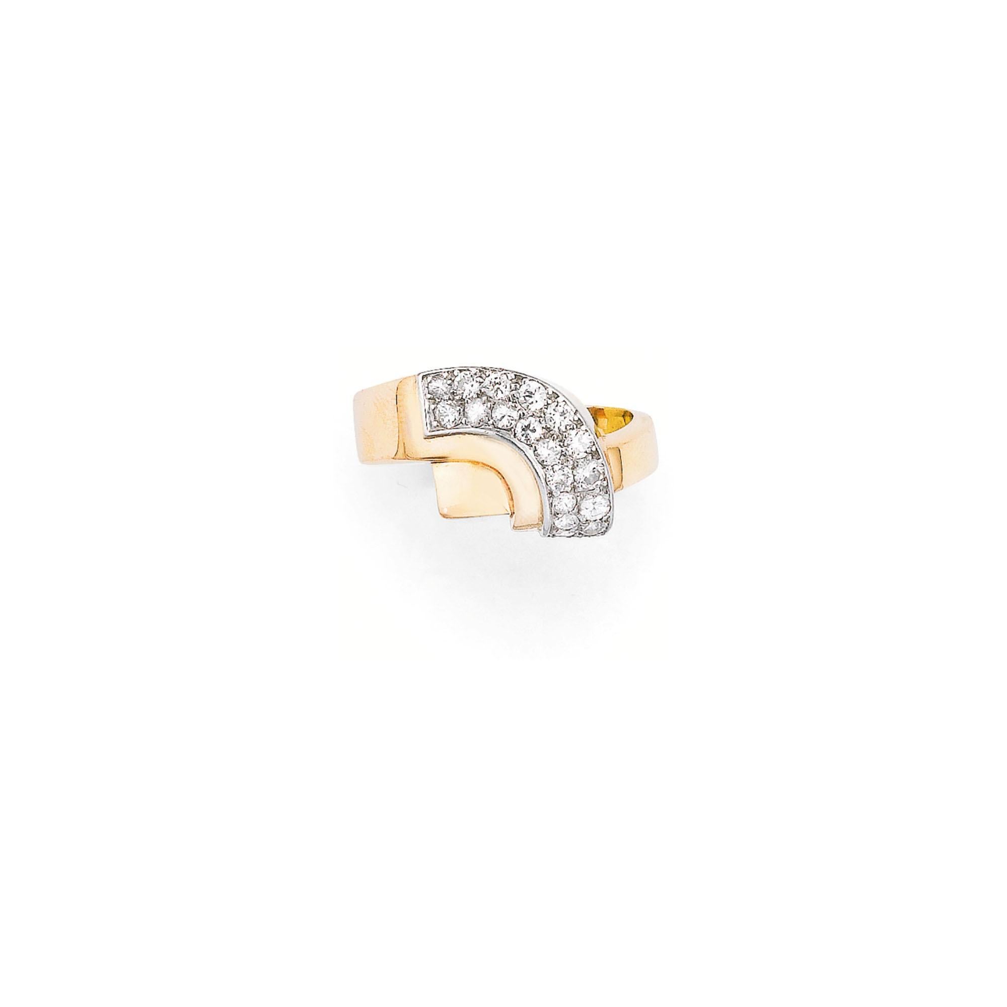 A chic Van Cleef Arpels ring of geometric design, set with circular-cut diamonds in 14 karat gold and platinum. Made in France.