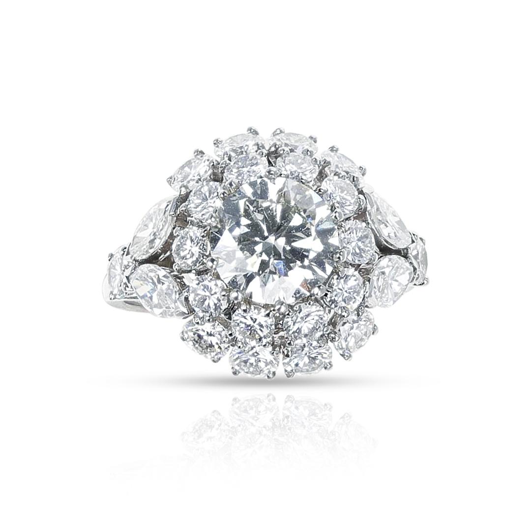 A Van Cleef & Arpels GIA Certified 1.86 ct. Center Diamond Ring made in Platinum. The diamond is K color, VVS 2 clarity. The side diamonds total appx. 4 carats. The total weight is 7.50 grams. The ring size is US 7.50. 