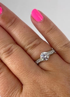 Van Cleef & Arpels 0.77 carat Round Diamond Solitaire Bypass Ring