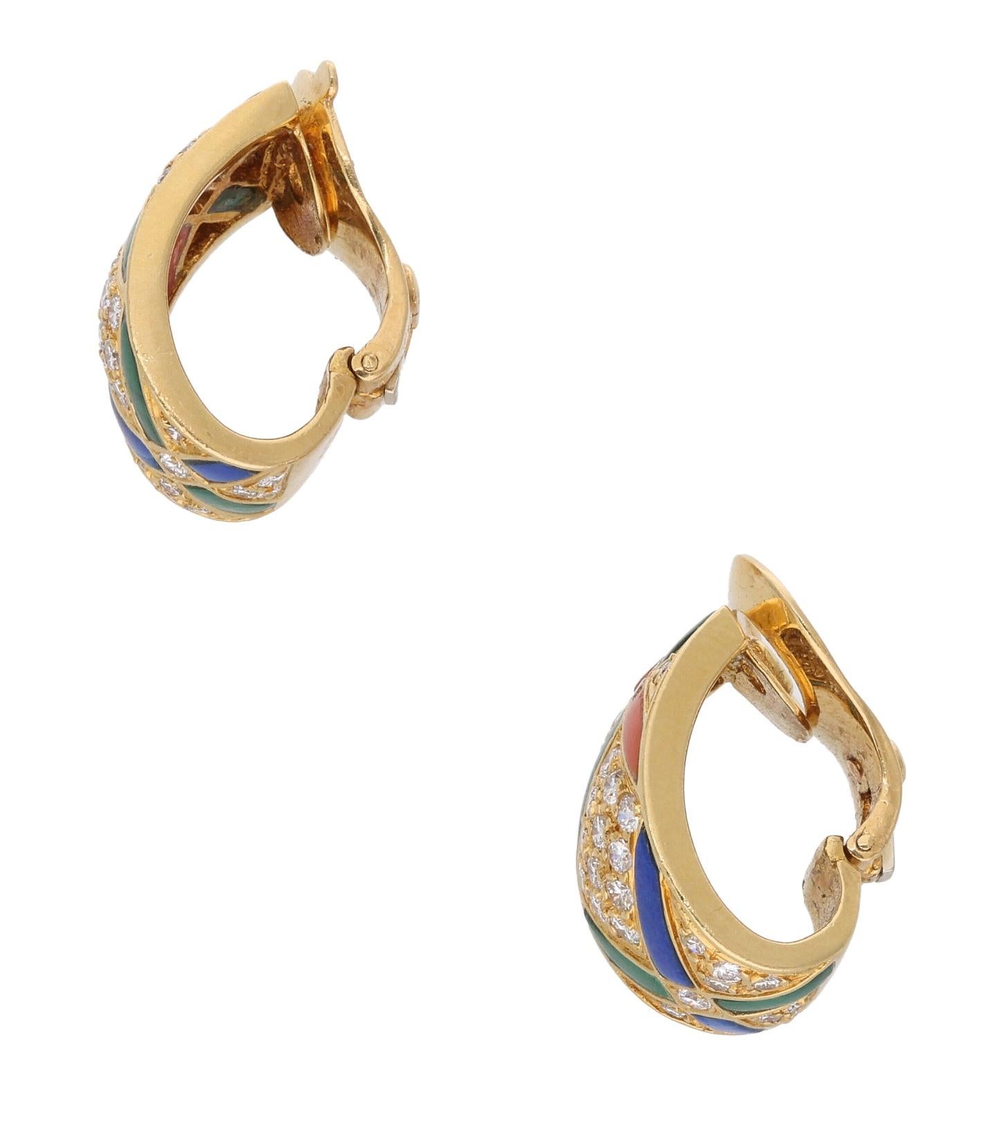 These ear clips feature a geometric design, set with lapis lazuli, malachite, coral, and diamonds.

- The diamonds weigh a total of approximately 0.50 carat
- Signed Van Cleef & Arpels (VCA)
- France
- 18 karat yellow gold
- Total weight 16.75