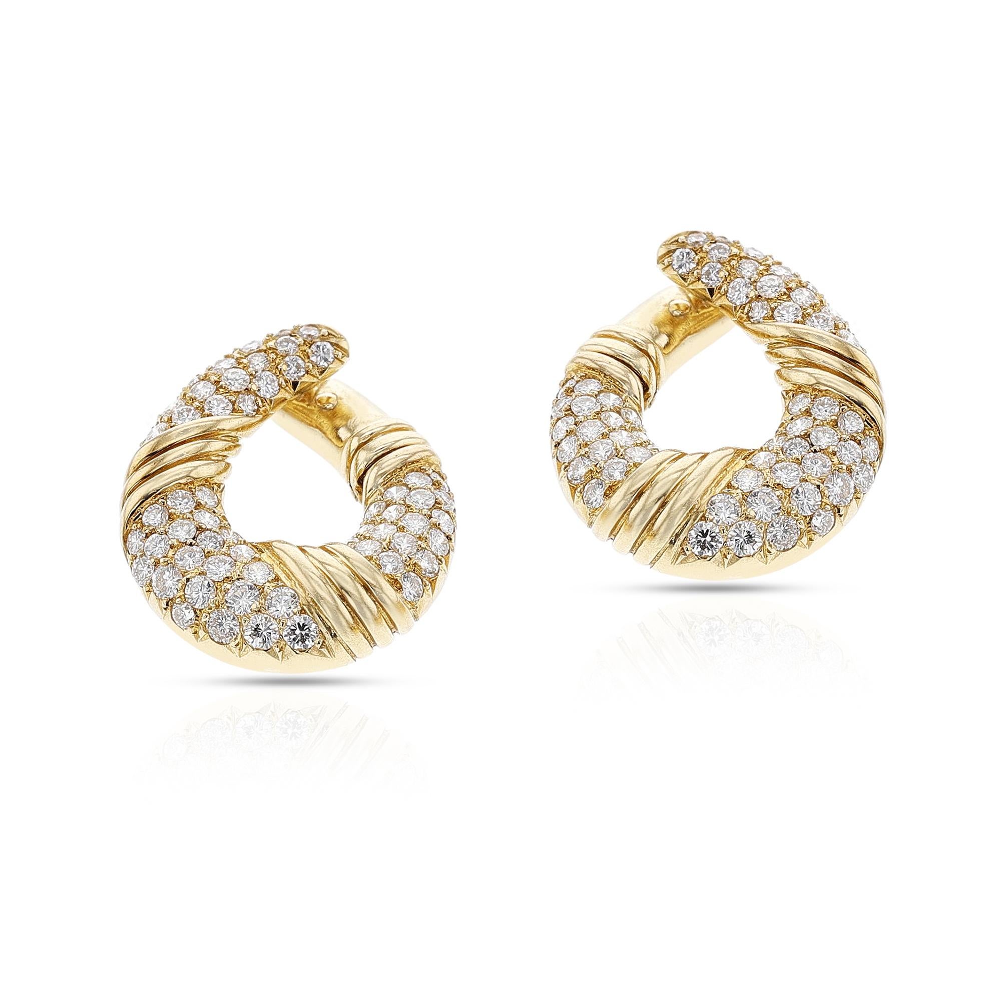 A pair of Van Cleef & Arpels Gold and Diamond Earrings made in 18k Yellow Gold. The earrings weigh 13 grams, and the dimensions are 0.90 inches x 0.64 inches. Signed and Numbered.



SKU: 1511