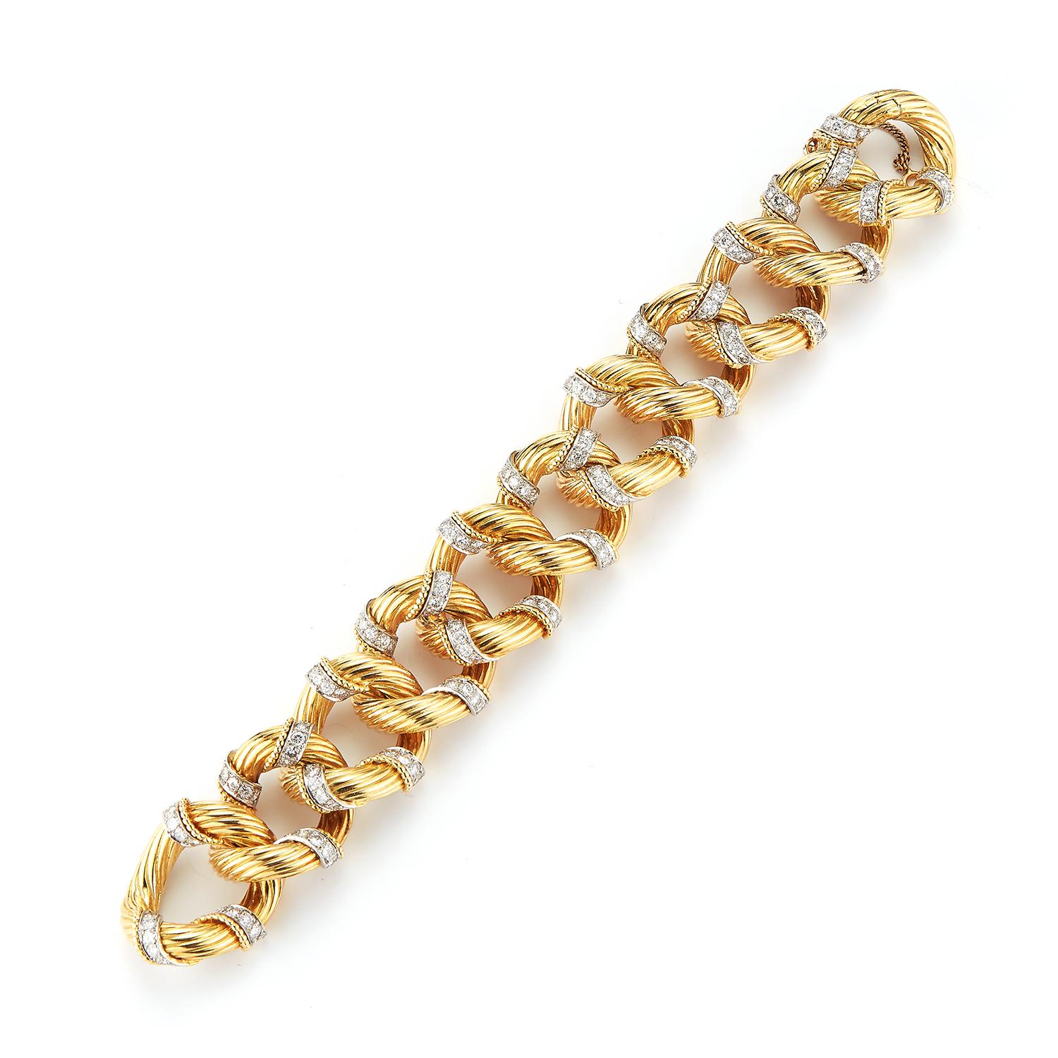 Van Cleef & Arpels Gold & Diamond Link Bracelet with safety lock 18K Yellow Gold 
165 Brilliant Cut Diamonds
Measurements: 7.5