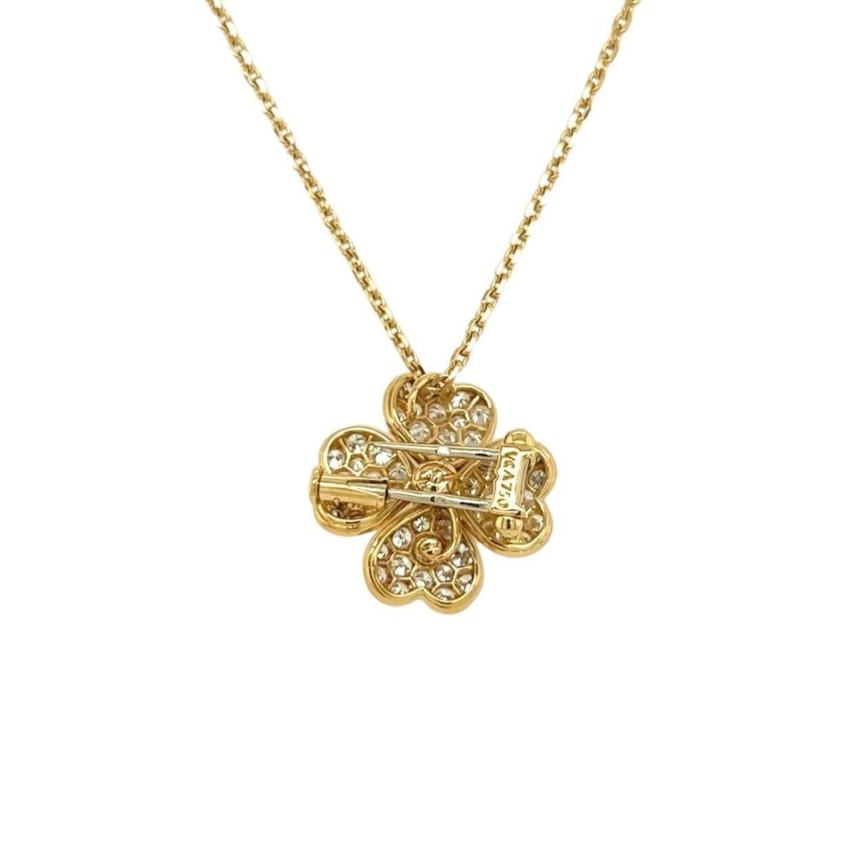 An 18 karat yellow gold and diamond necklace, Van Cleef & Arpels.  The “Cosmos” necklace designed as a fine cable chain suspending a pendant/brooch of a four petaled flower the petals pave set with approximately fifty two (52) round brilliant cut