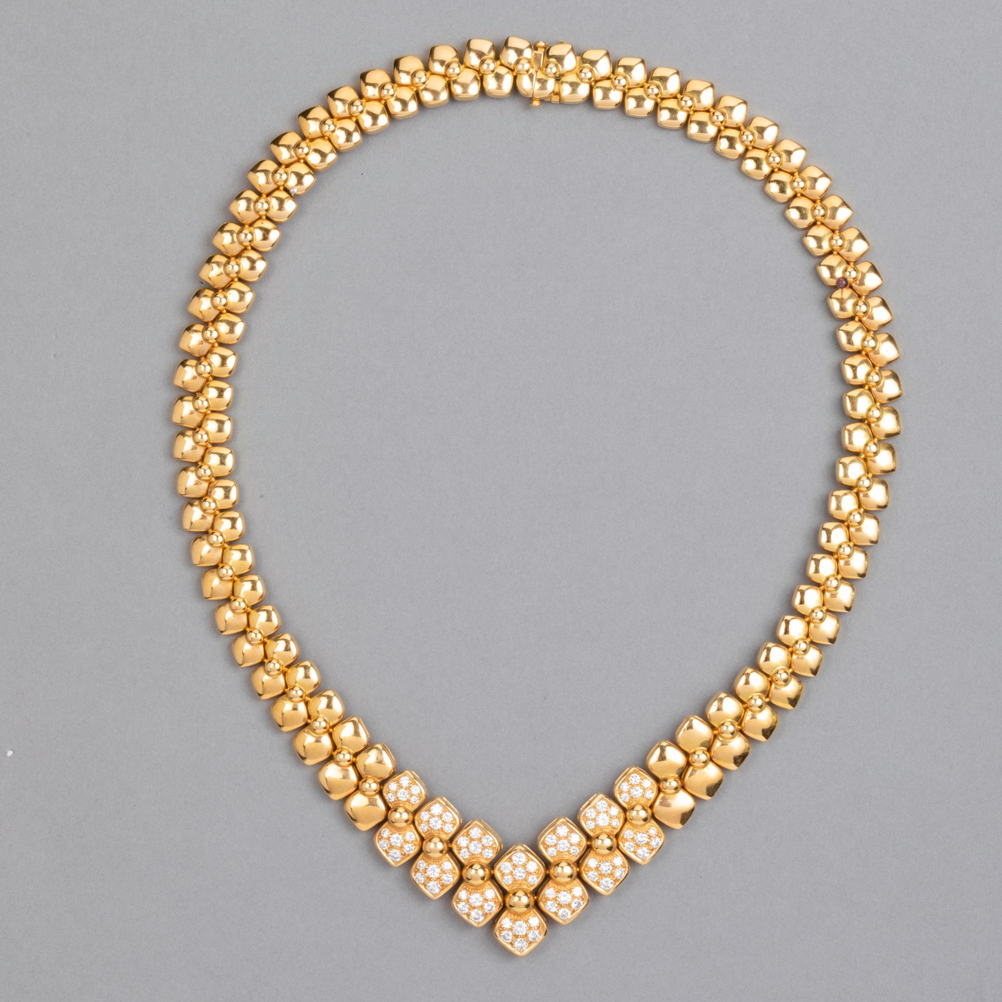 Very Beautiful Gold and diamonds necklace from Van Cleef & Arpels. 

This is a Rare Model, Made In France circa 1970. Propeller design for the chain.
The length is 41,5 cm and the weight is 116 gr. 
The necklace has 84 diamonds. 
The piece is signed