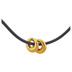 Van Cleef & Arpels Gold Circle Pendant Set on Cord Necklace