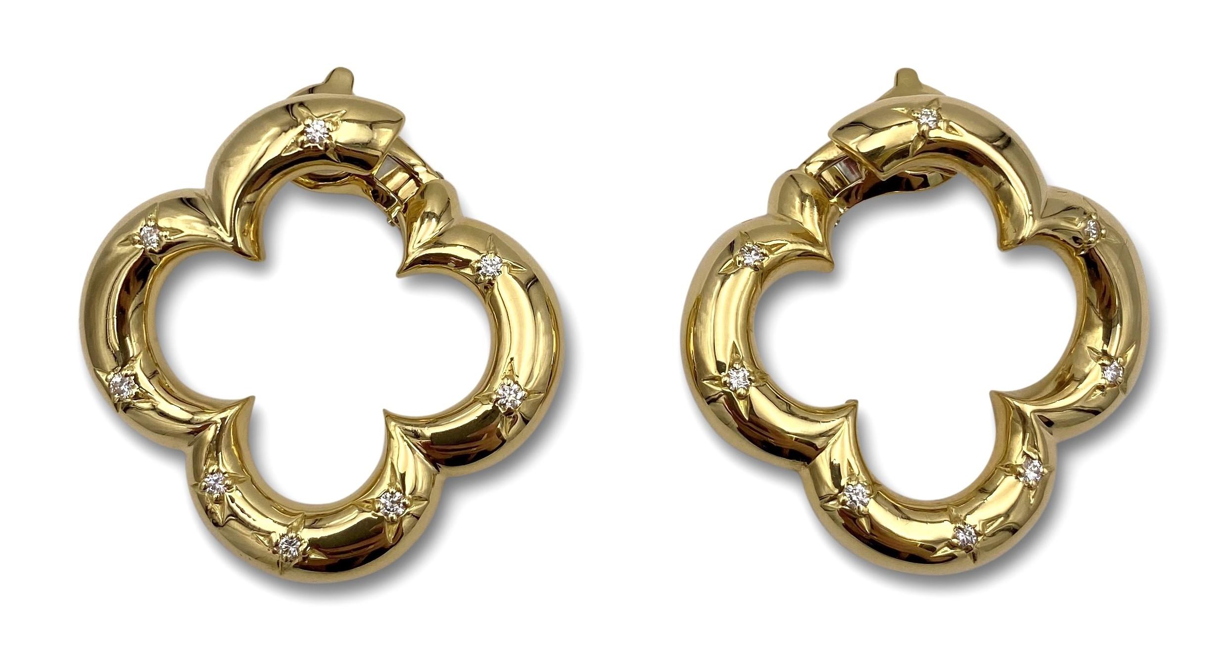 Authentic pair of Van Cleef & Arpels Alhambra earrings made in 18 karat yellow gold with 16 round cut diamonds.  CIRCA 1998.  Signed VCA, 1998, 750, with hallmarks and serial numbers.  1.45 in x 1.53 in.  Lever back clip on earrings