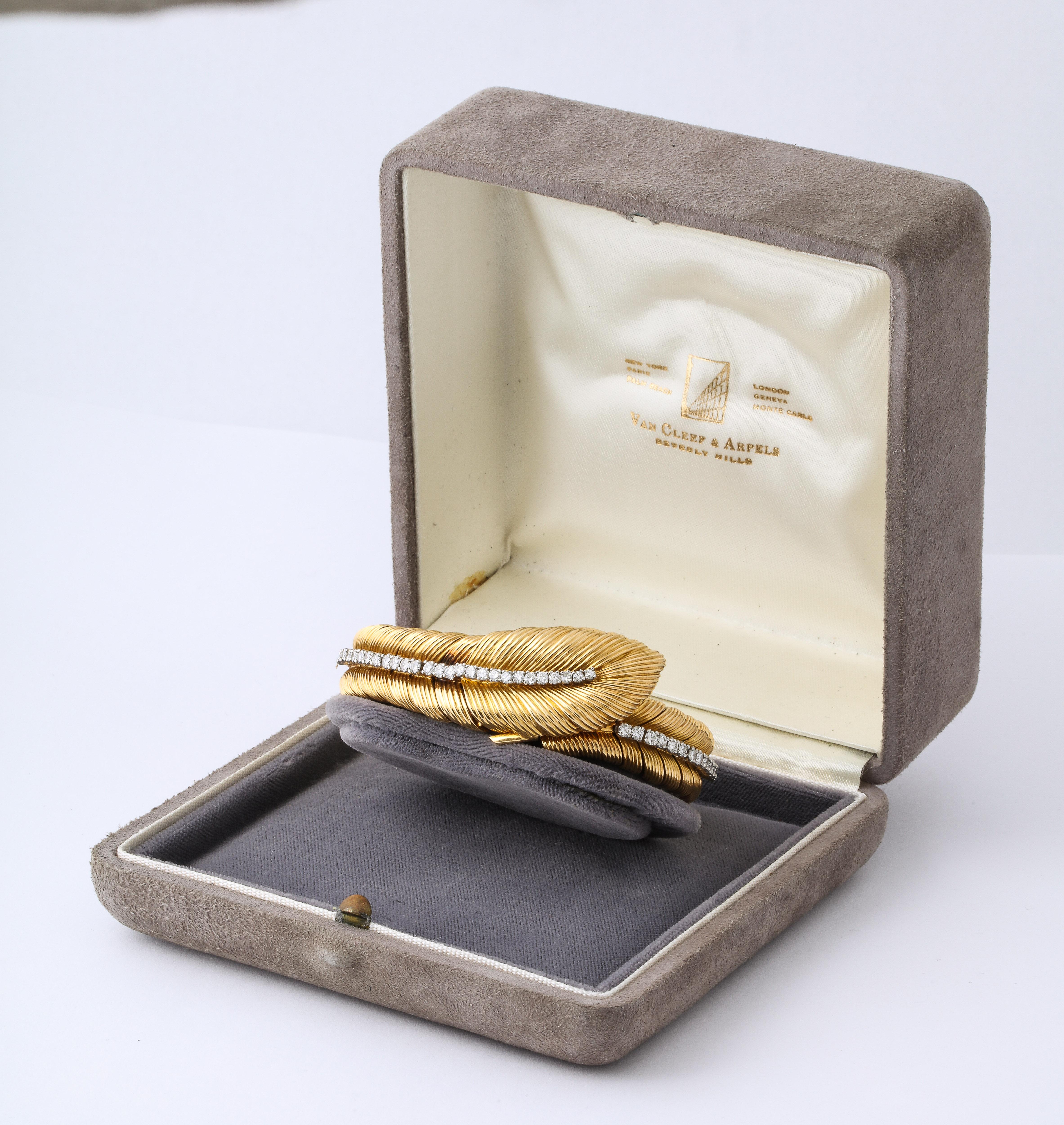 Vintage 1950's Van Cleef & Arpels Diamond Bracelet Watch with Box, set with round brilliant cut diamonds, designed as a foliate bracelet with a watch compartment, signed Movado
70 Grams 
6 ¼ inch total length
Movement Movado
Signed Van Cleef &