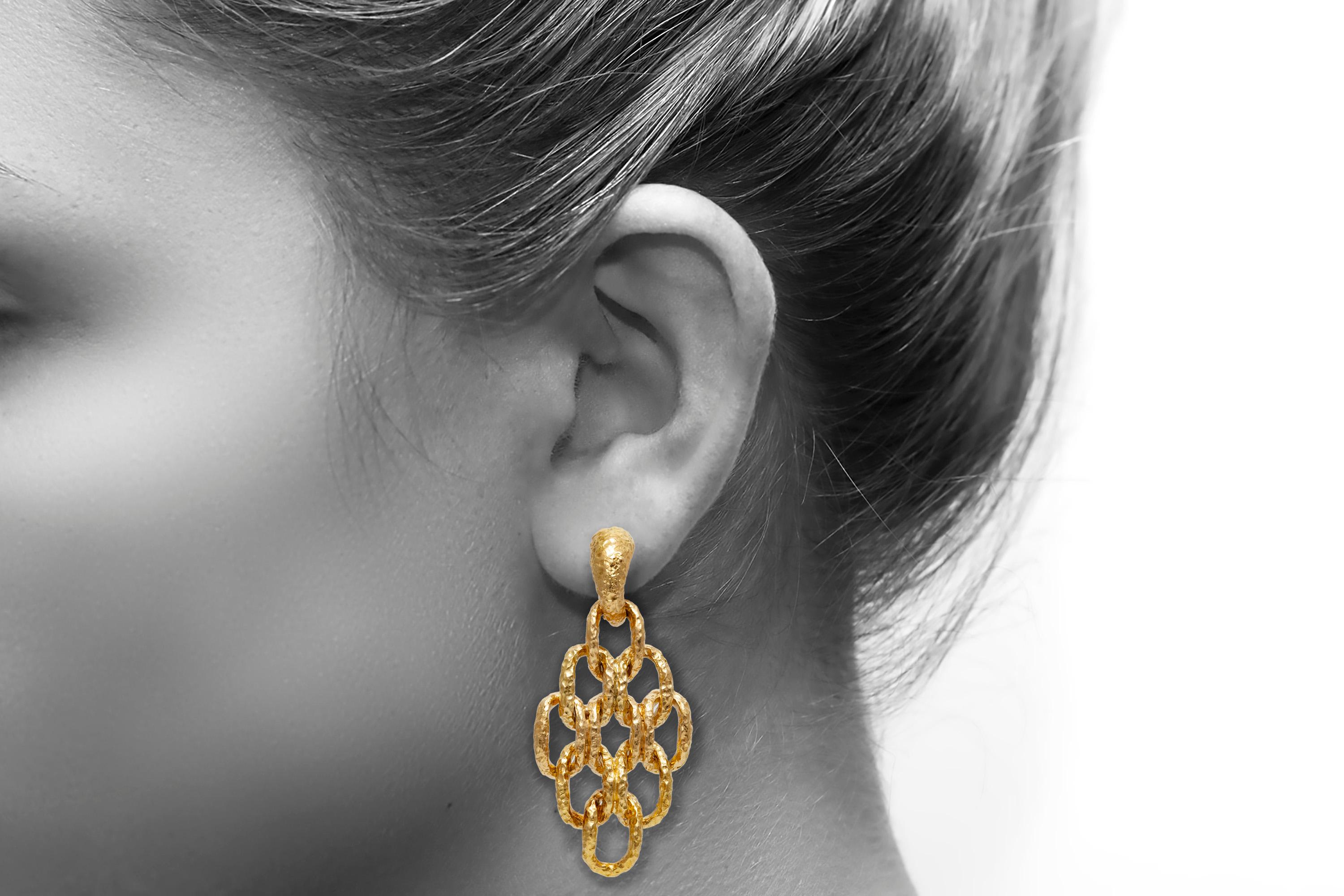 Van Cleef & Arpels earrings, finely crafted in 18k yellow gold weighing 29.9 dwt.