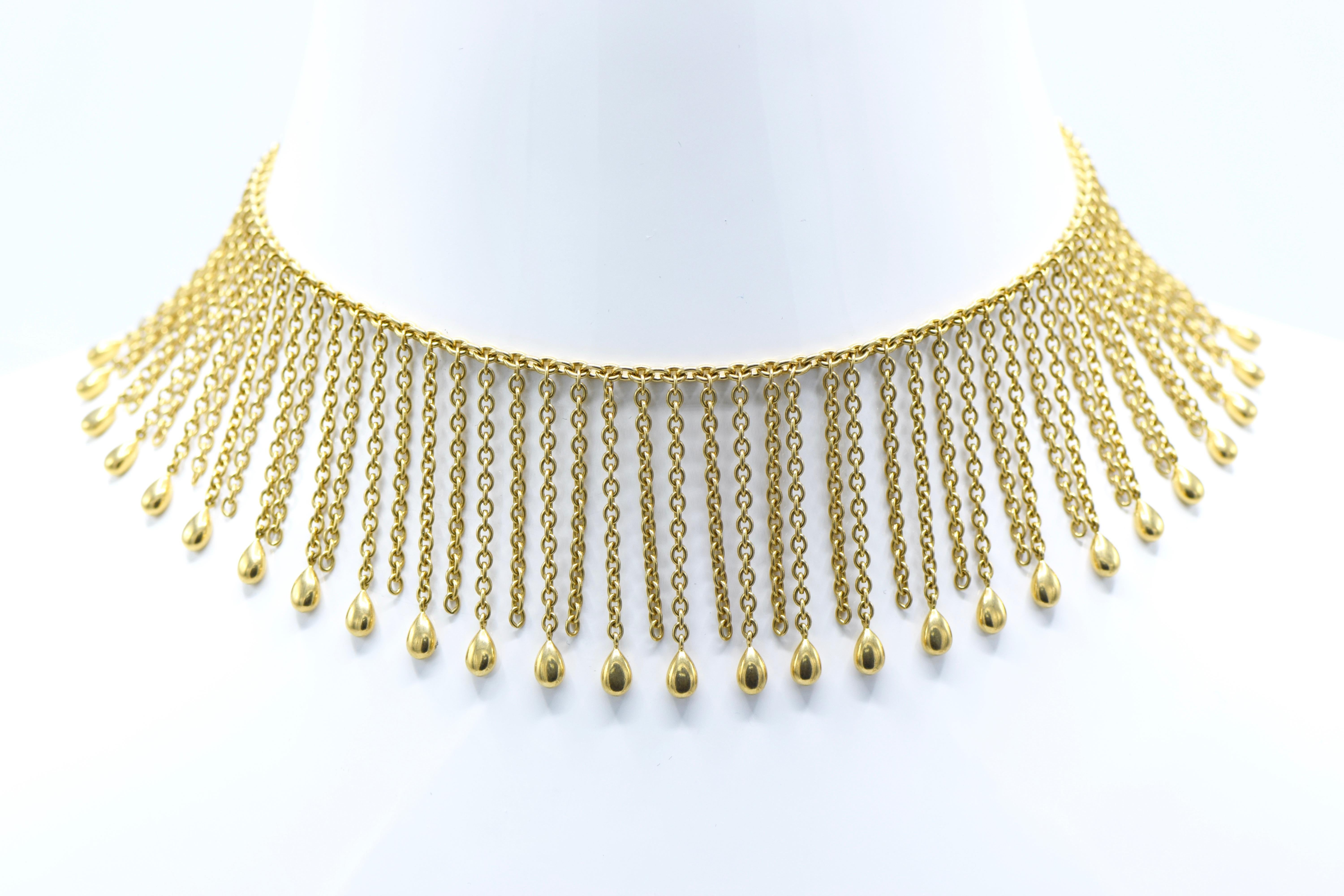 Van Cleef & Arpels Gold 'Fringe' Necklace and Bracelet 

Comprising a choker necklace and bracelet, designed as a series of gold link fringe with alternating polished gold terminals, mounted in 18K yellow gold 

Bracelet length: 7 inches 

Necklace