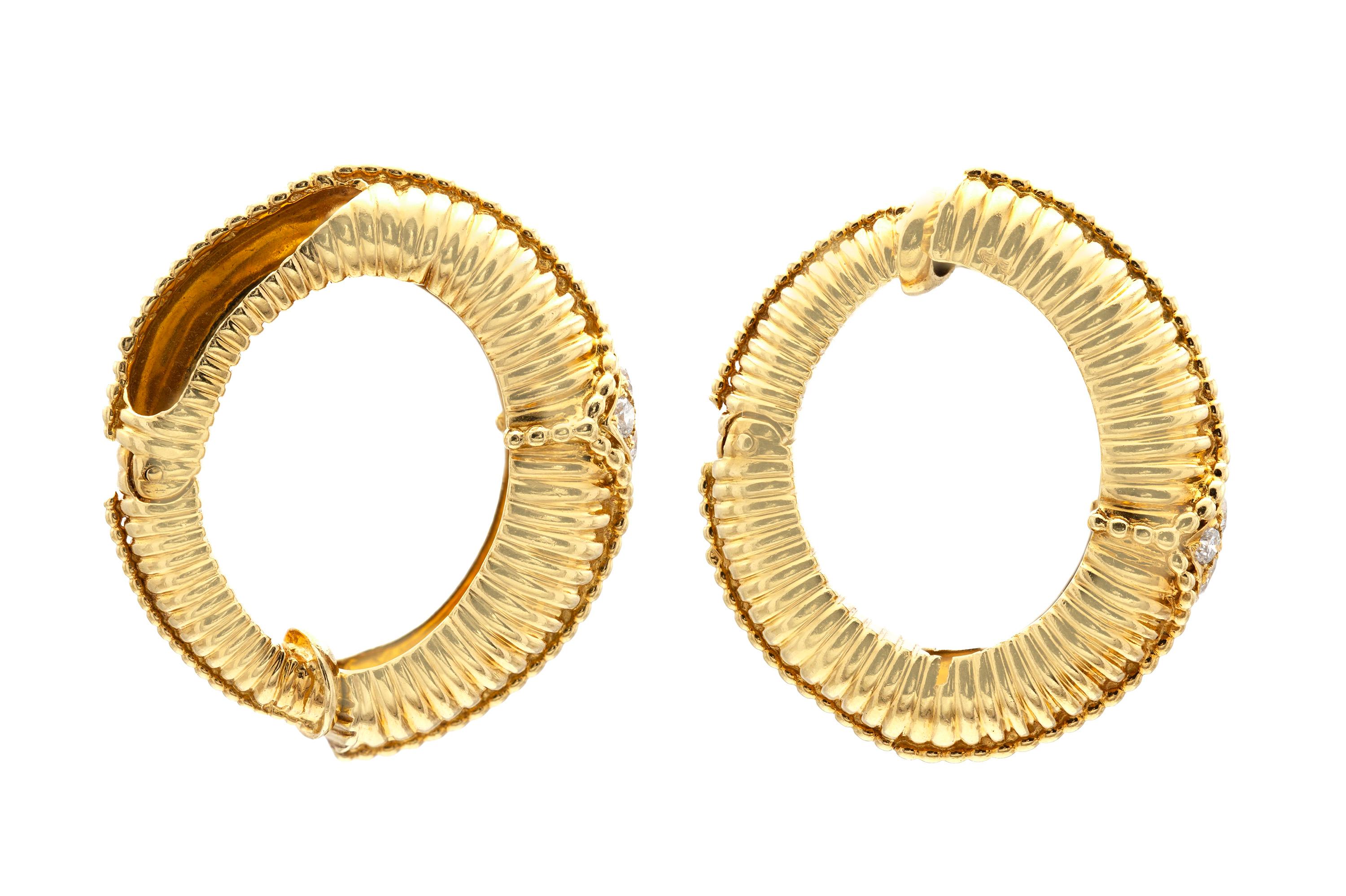 Finely crafted in 18k yellow gold with 4 round brilliant cut diamonds on each earring, weighing approximately a total of 0.80 carats.
Signed by Van Cleef & Arpels
Circa 1973