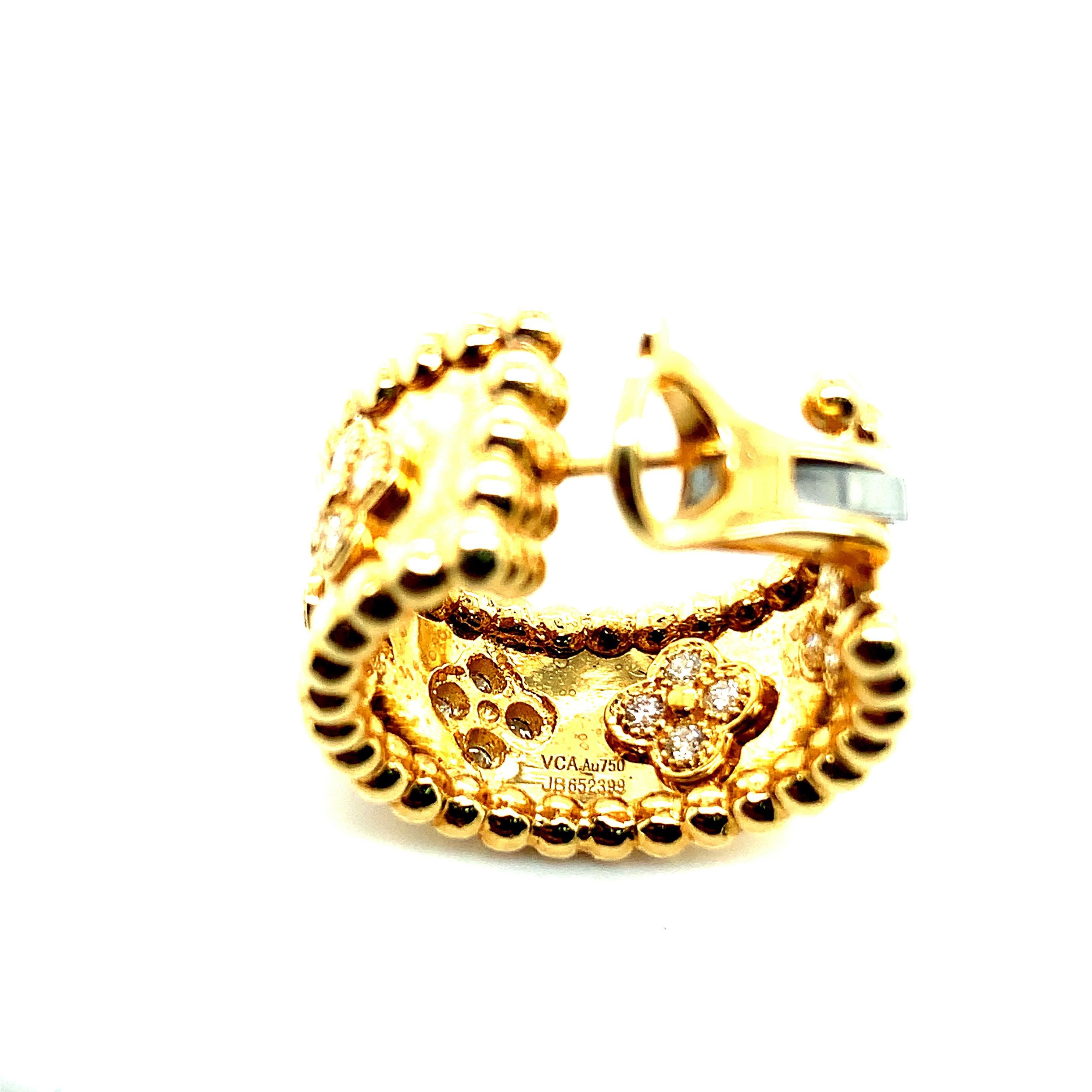 Van Cleef & Arpels Gold Perlée Clovers Hoop Earrings In Excellent Condition In New York, NY