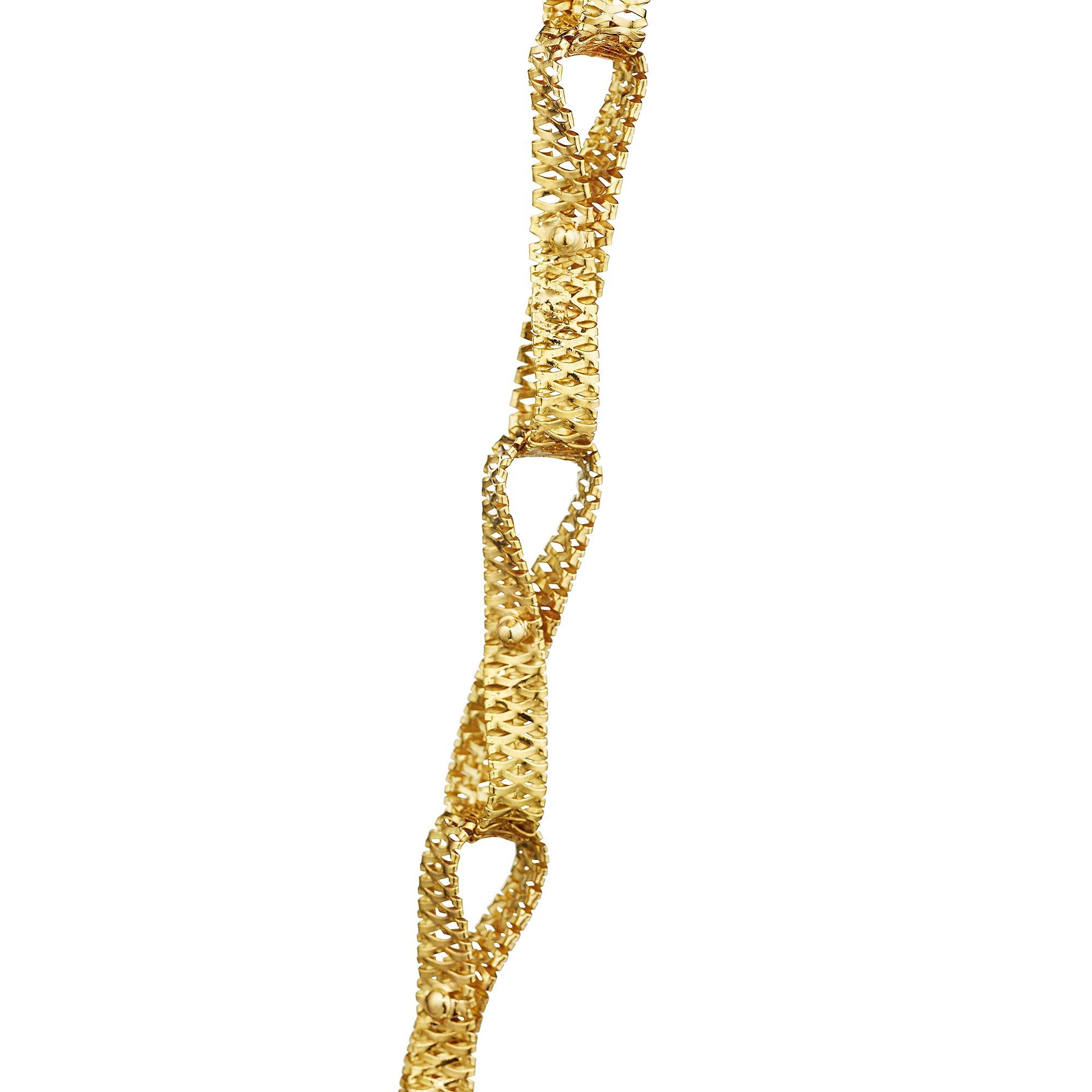 Tie this Van Cleef & Arpels yellow ribbon vintage necklace around neck and you will feel like the gift you are.  Designed as an 18 karat yellow gold basket weave twisted ribbon link, this long and lean designer necklace will become the daily